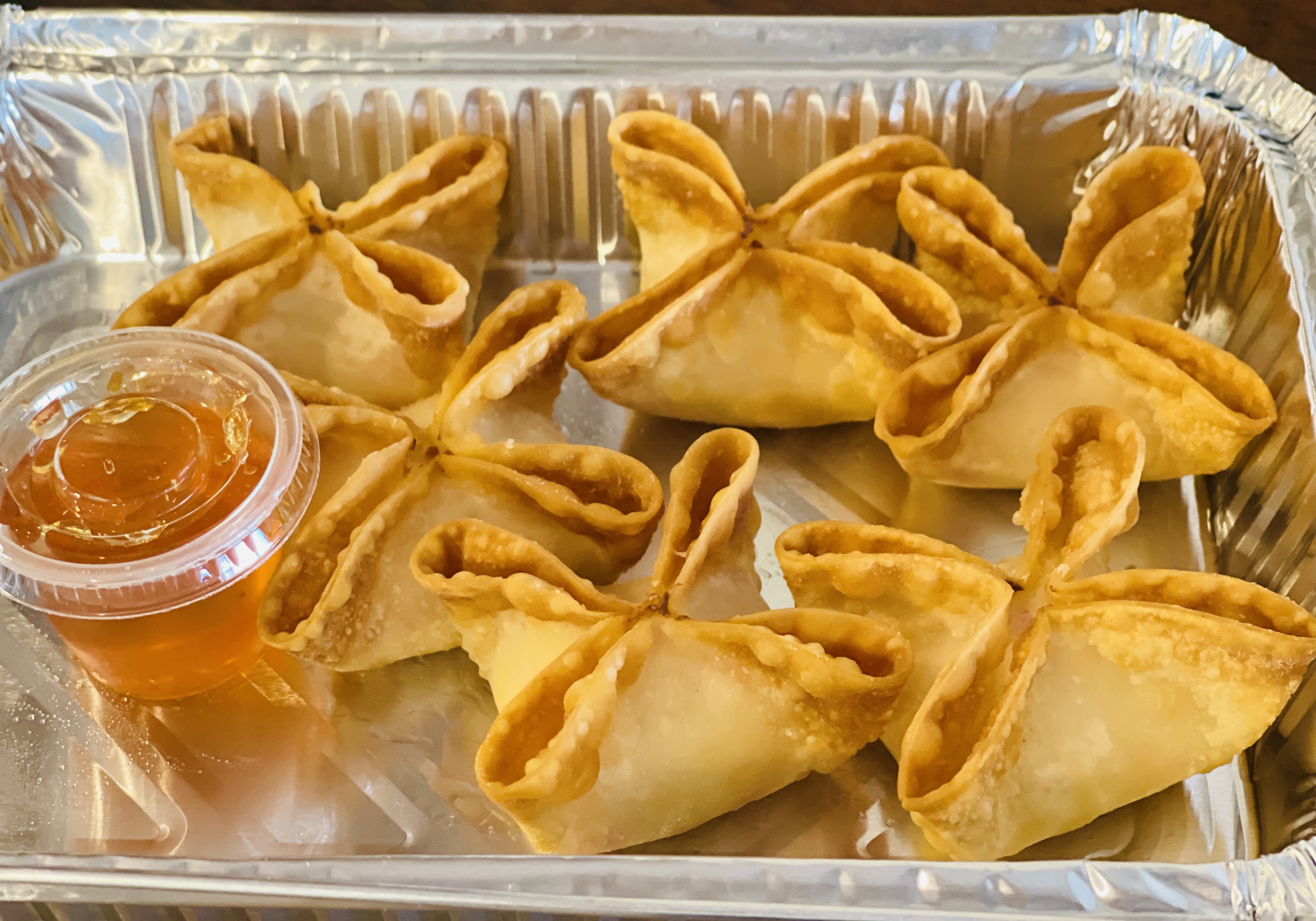 Order A6. Crab Rangoon food online from Pho and Thai store, Belmont on bringmethat.com