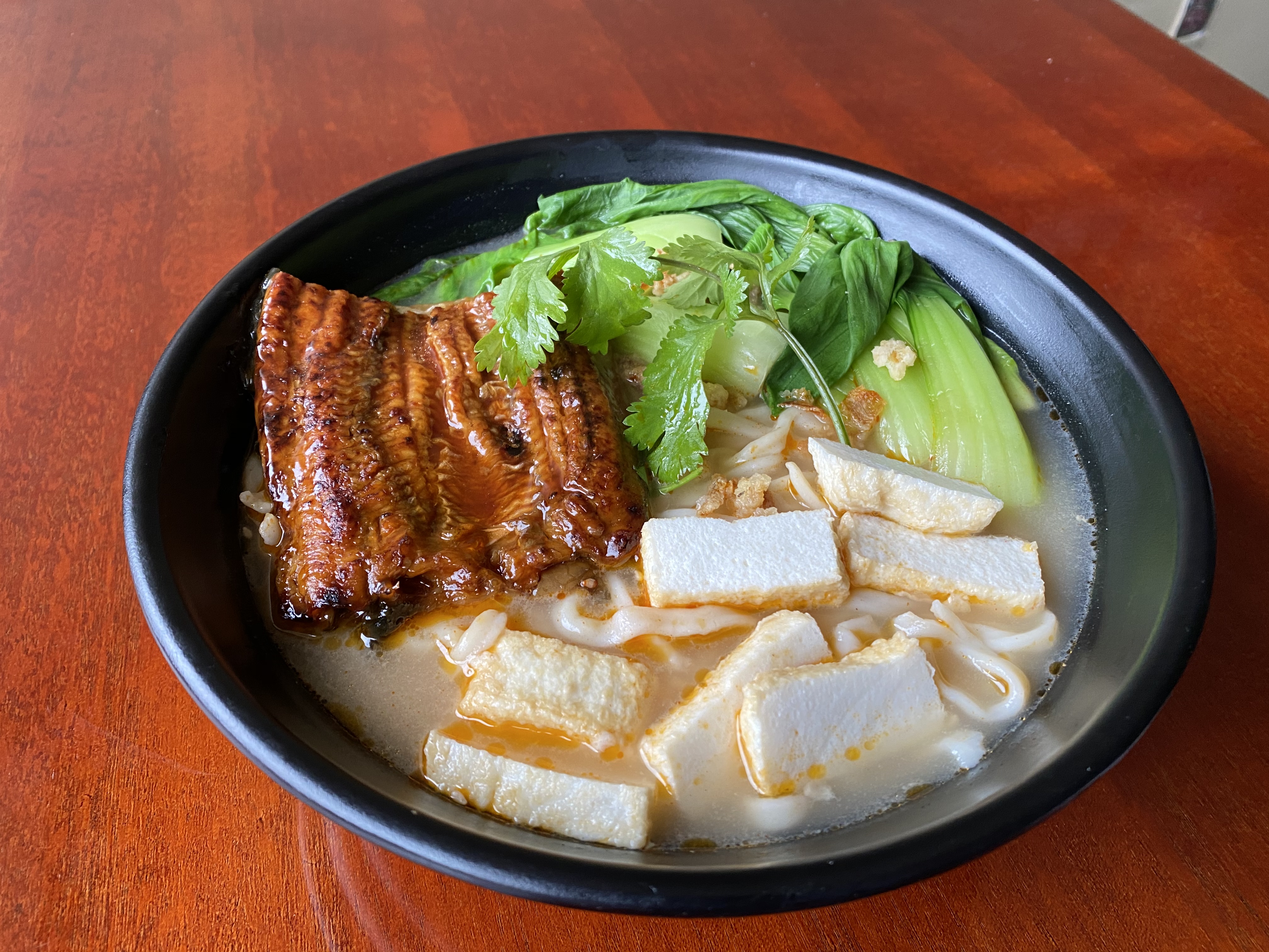 Order Teriyaki Eel Noodle Soup 照烧鳗鱼面 food online from Osaka House store, Madison on bringmethat.com