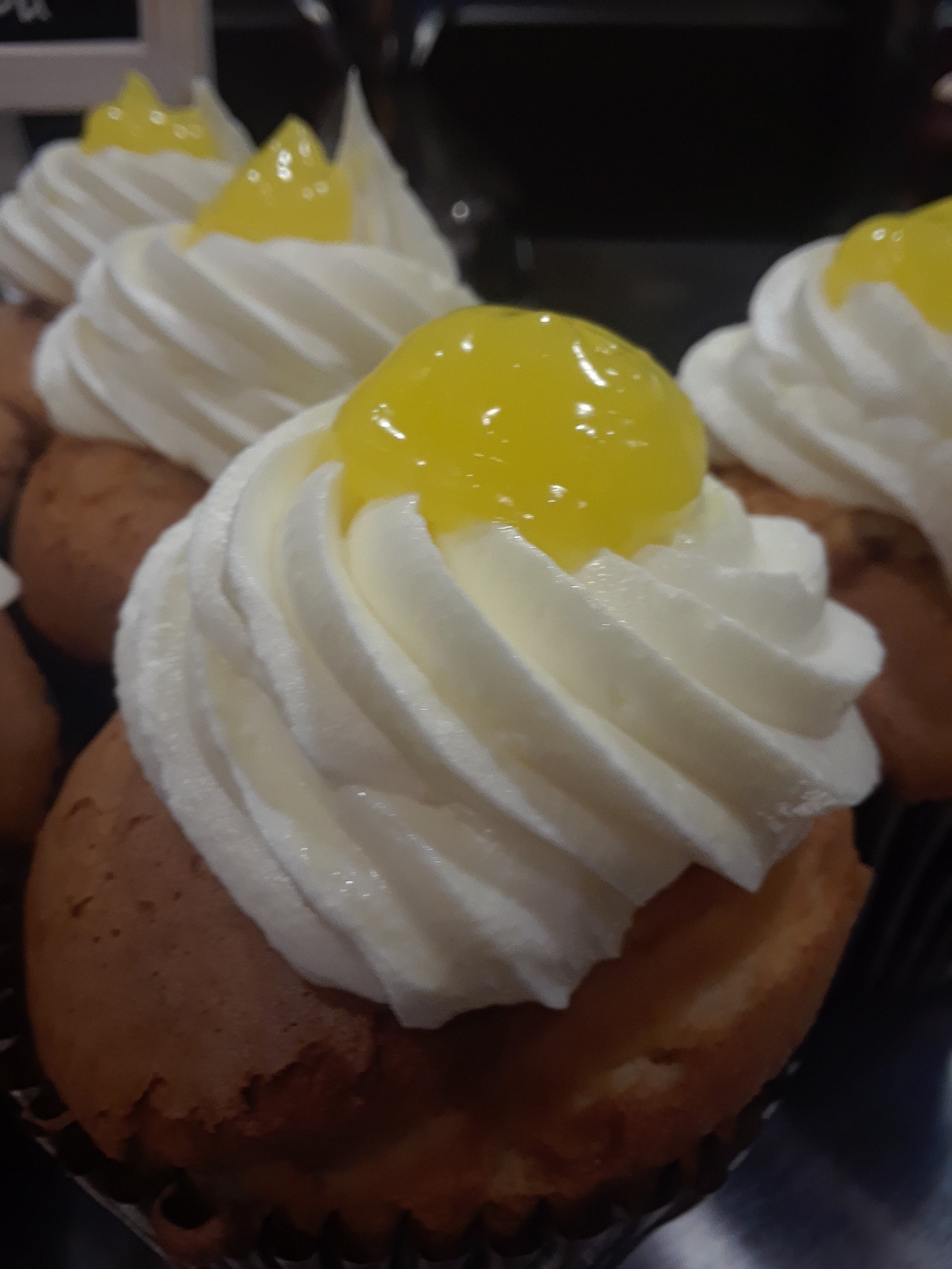Order Lemon Drop Cupcake food online from Smallcakes Cupcakery And Creamery store, Naperville on bringmethat.com