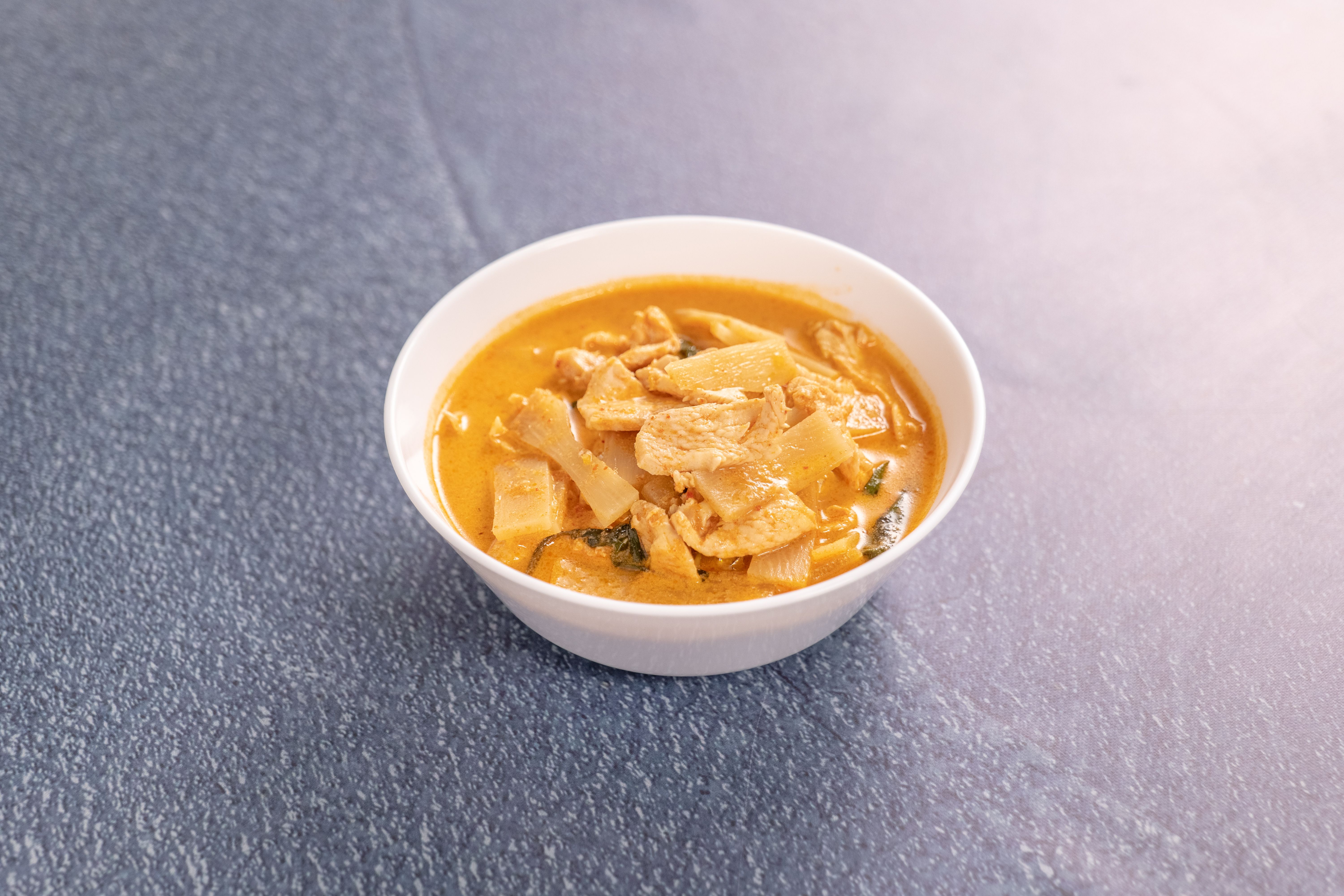 Order Red Curry food online from Cancoon Thai Restaurant store, Bellflower on bringmethat.com