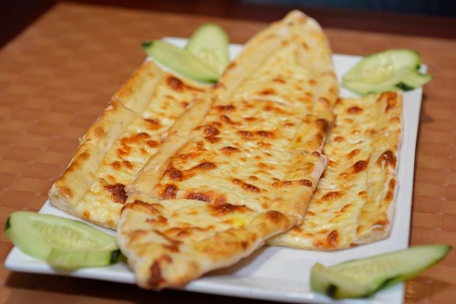 Order Kashkaval - Mozzarella Cheese Pide food online from AkCafe store, Clifton on bringmethat.com