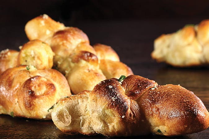 Order Truffle Garlic Knots* food online from Russo's Pizza store, Galveston on bringmethat.com