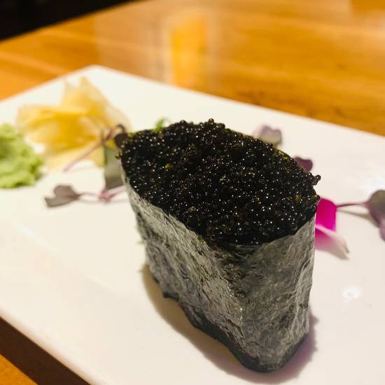 Order Tobiko-Black (Flying Fish Roe) food online from Hot Woks Cool Sushi store, Chicago on bringmethat.com