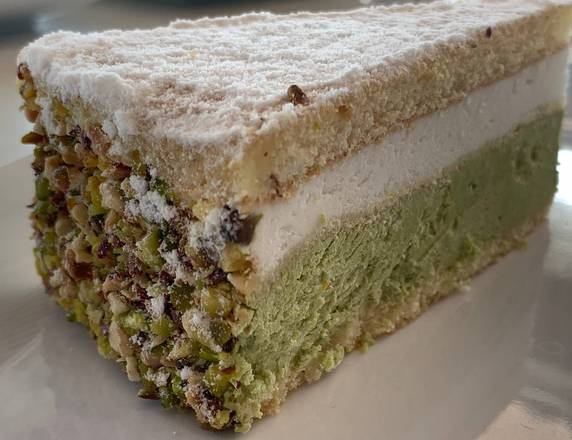 Order Ricotta & Pistachio Cake food online from L'Artisan Cafe &amp; Bakery store, Providence on bringmethat.com
