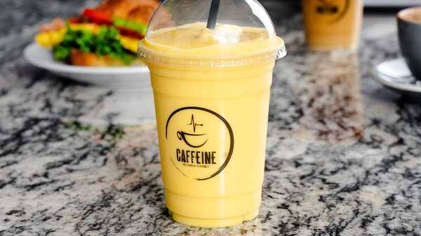 Order Tropical Mango Smoothie food online from Caffeine store, Lakewood on bringmethat.com
