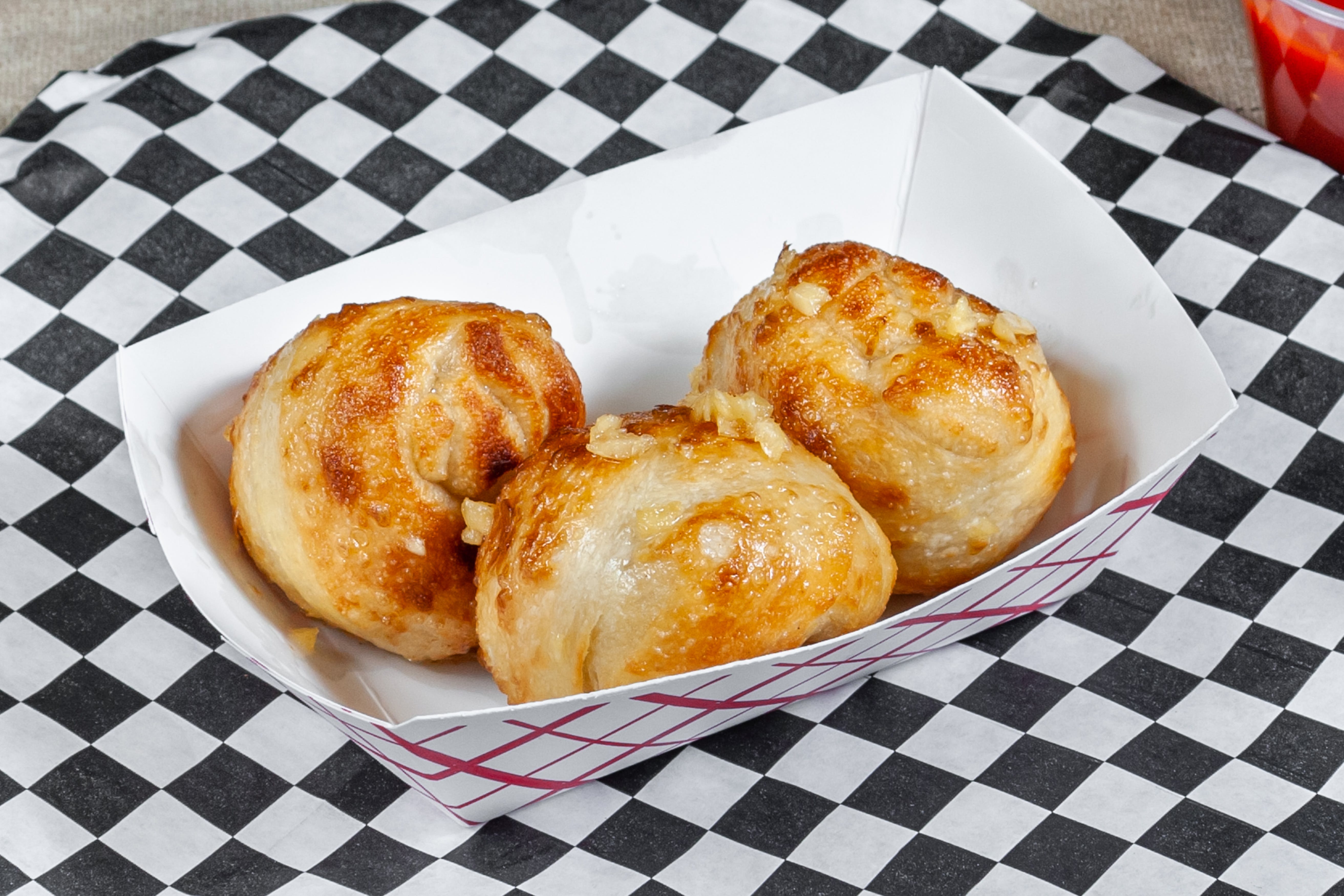 Order Garlic Knots - 3 Pieces food online from Geno D's Pizza store, Charlotte on bringmethat.com