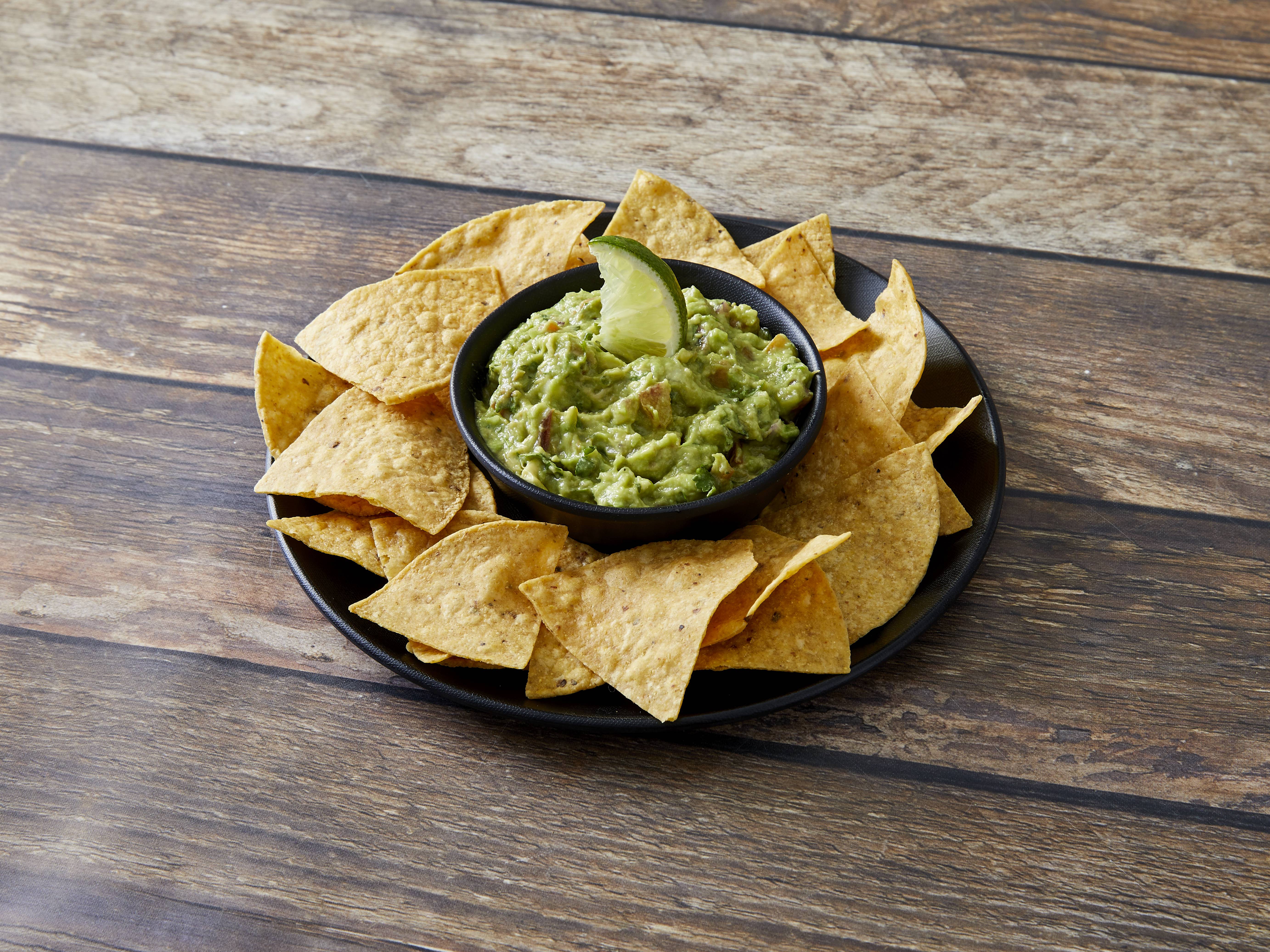 Order Guacamole with Chips food online from Los Portales Mexican Restaurant store, Chicago on bringmethat.com