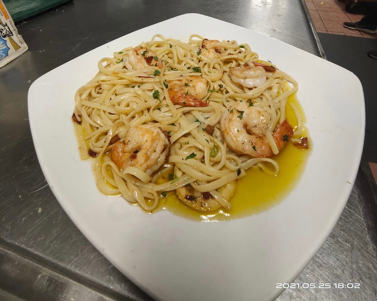 Order Shrimp Scampi - Entree food online from Nino Italian Restaurant store, Reading on bringmethat.com
