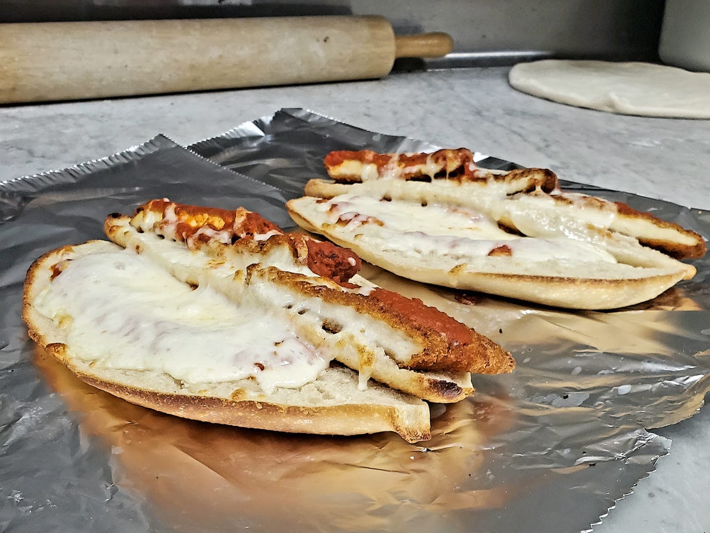 Order Chicken Parmigiana Sandwich - 10" food online from Livingston Pizza store, Livingston on bringmethat.com