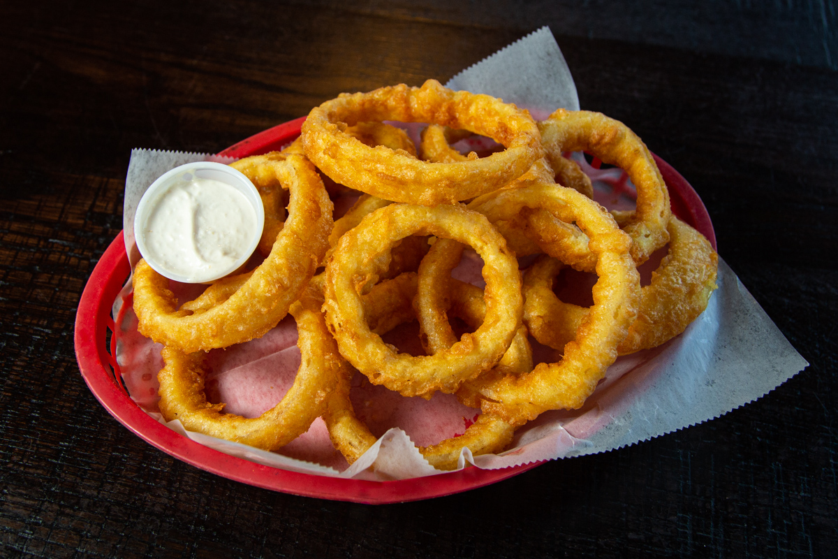 Order Hand Battered Onion Rings food online from Iron Grill Bbq store, Columbus on bringmethat.com