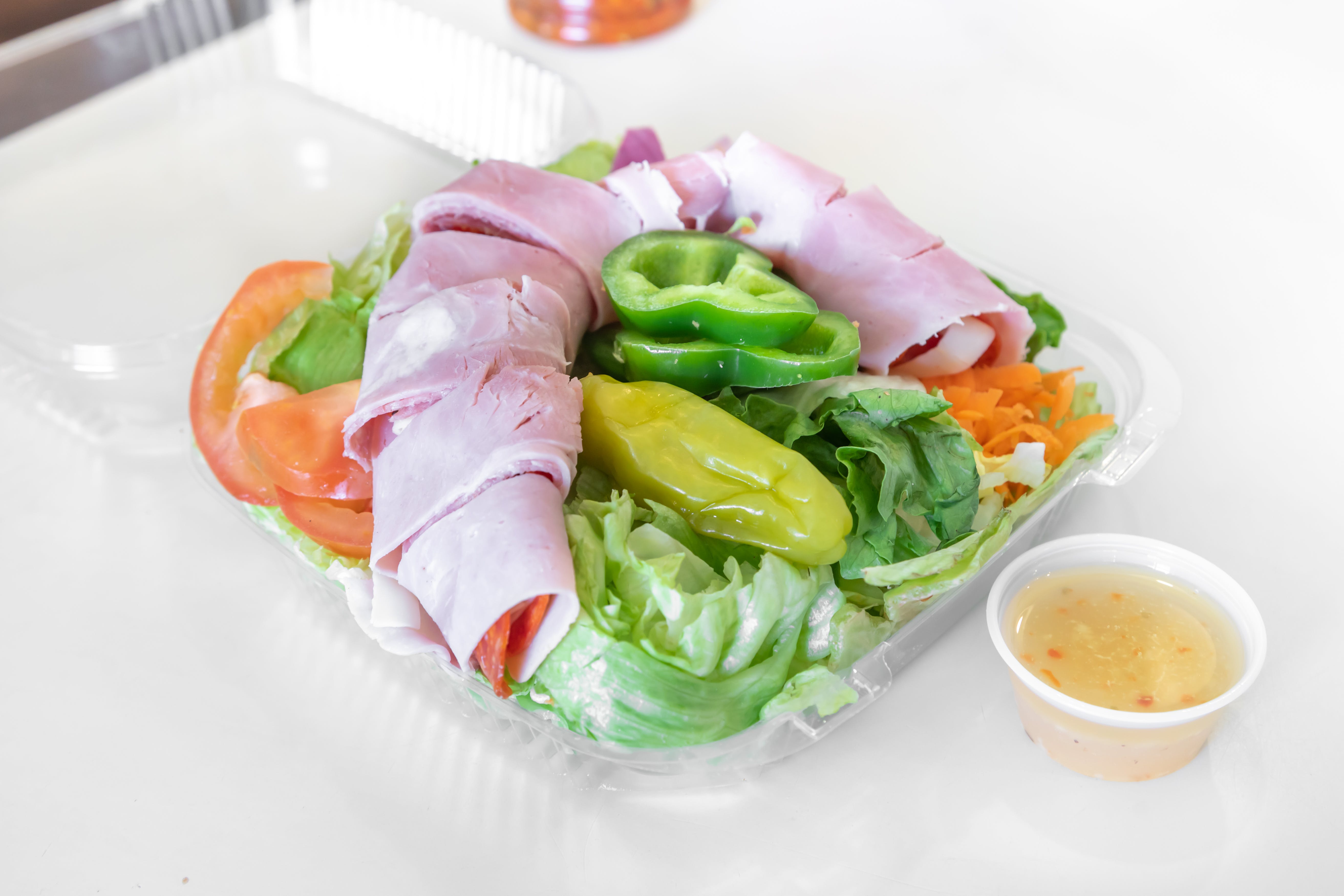 Order Antipasto Salad - Salad food online from West Broadway Pizza & Seafood store, Gardner on bringmethat.com