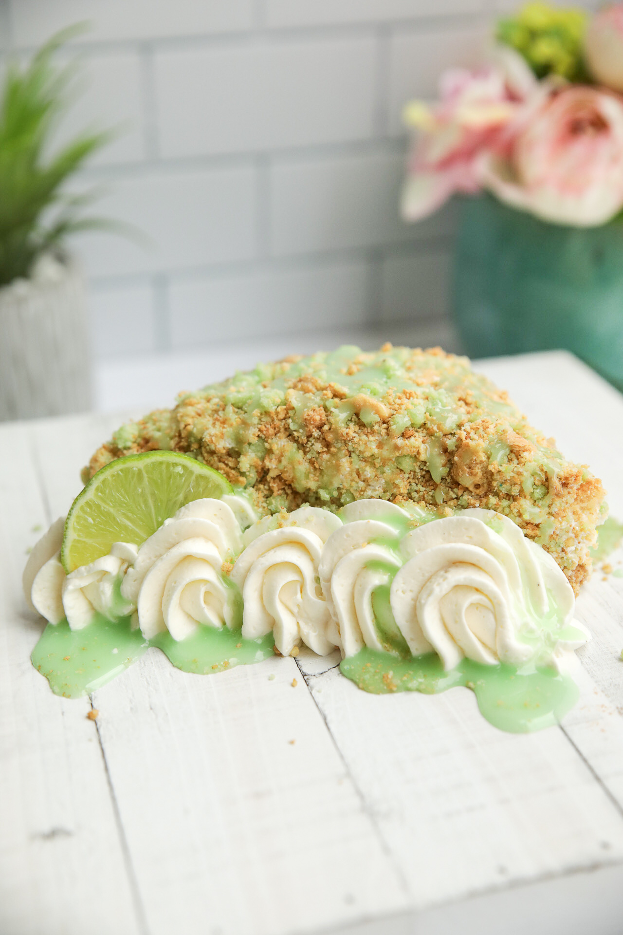 Order Key Lime Crunch Cheesecake food online from Savor Moment Bakery & Dessert Cafe store, Greensboro on bringmethat.com