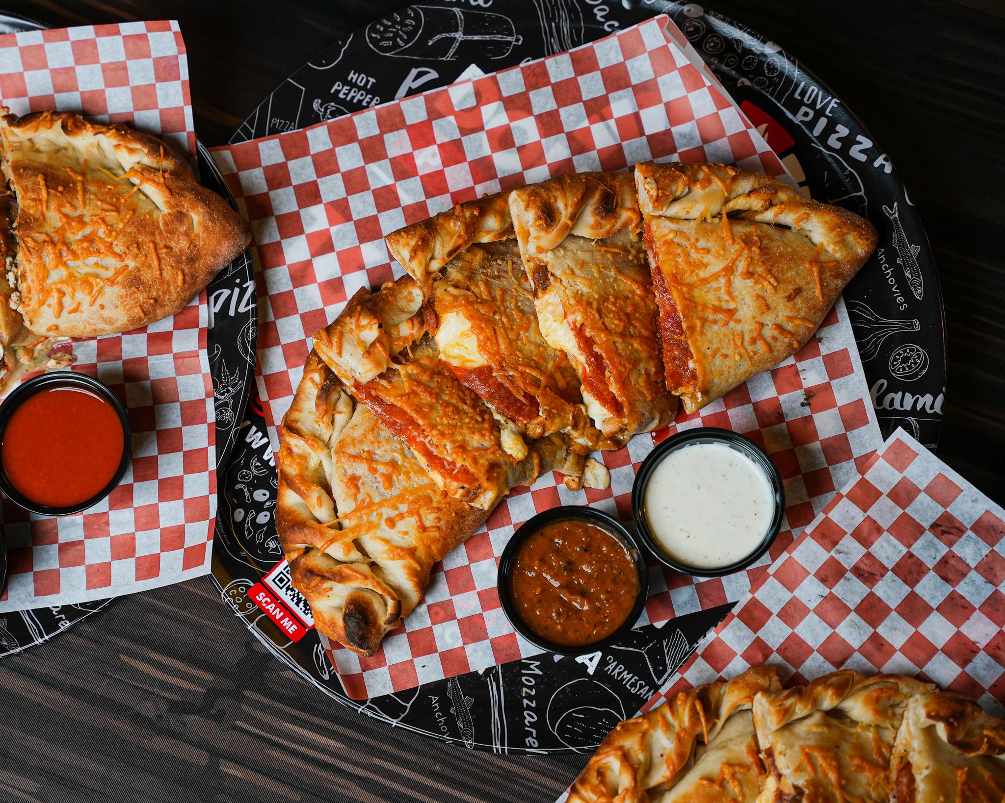 Order Build Your Own Calzone food online from Dough Boys Pizzeria store, Clovis on bringmethat.com