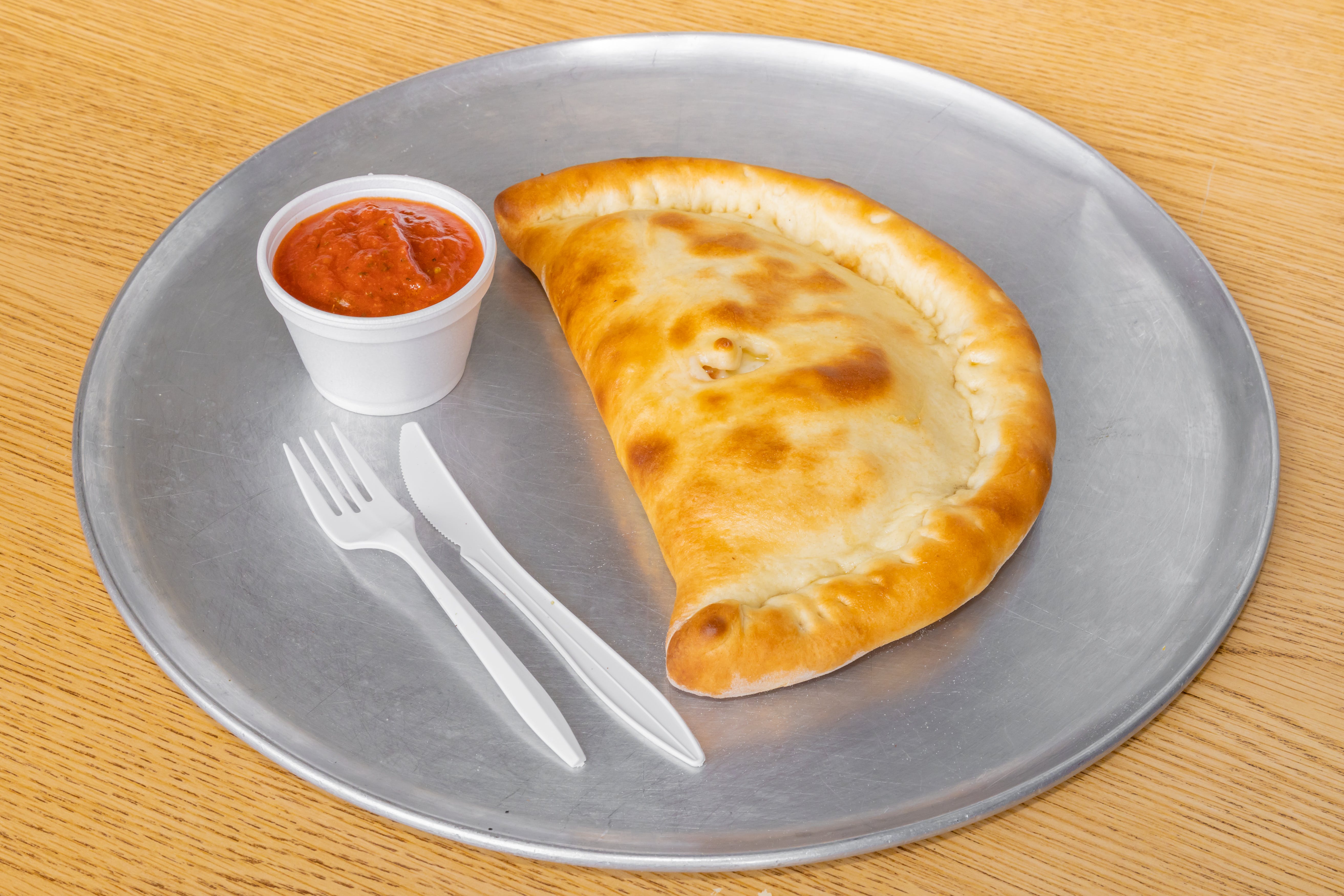 Order Calzone - Calzone food online from Emilio's Pizza store, Burbank on bringmethat.com