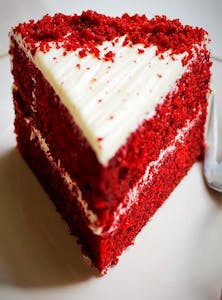 Order Red Velvet Cake Slice food online from Matthews Home Style Cooking store, Gardena on bringmethat.com