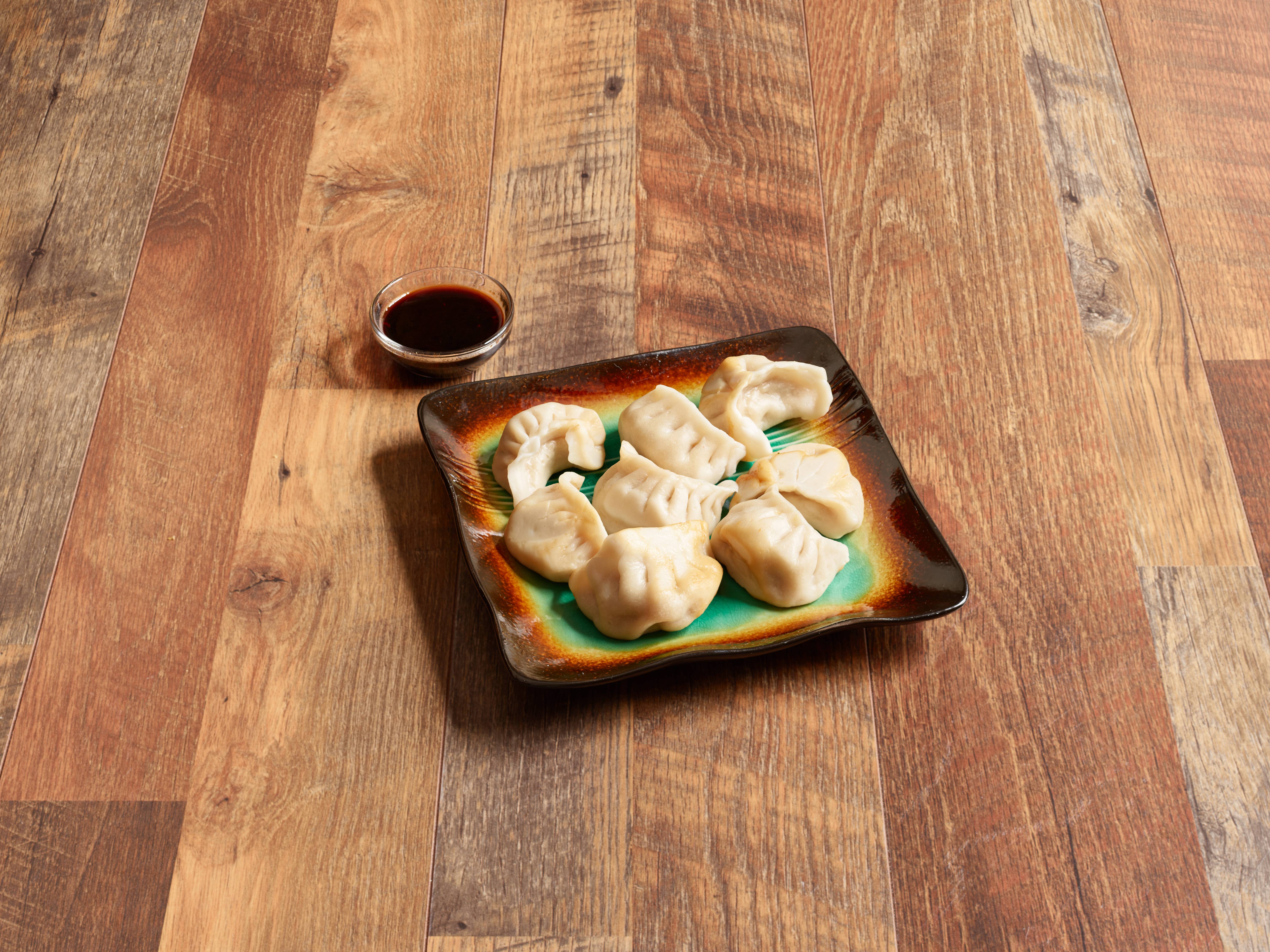 Order 8. Steamed Dumplings food online from En Lai Chinese store, Albany on bringmethat.com