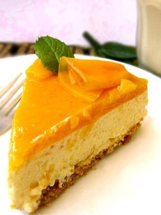 Order Mango Cheesecake food online from La Val's Pizza store, Albany on bringmethat.com