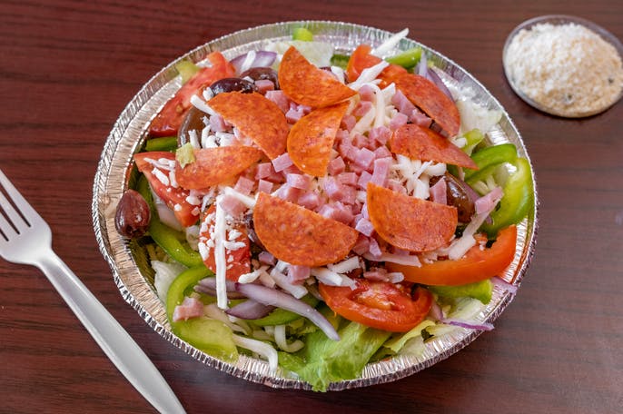 Order 12" Antipasto Salad food online from LA Pizza store, Victorville on bringmethat.com