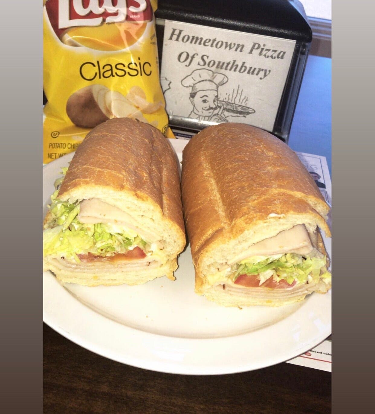 Order Turkey & Cheese Grinder - Whole 12'' food online from Hometown Pizza Of Southbury store, Southbury on bringmethat.com