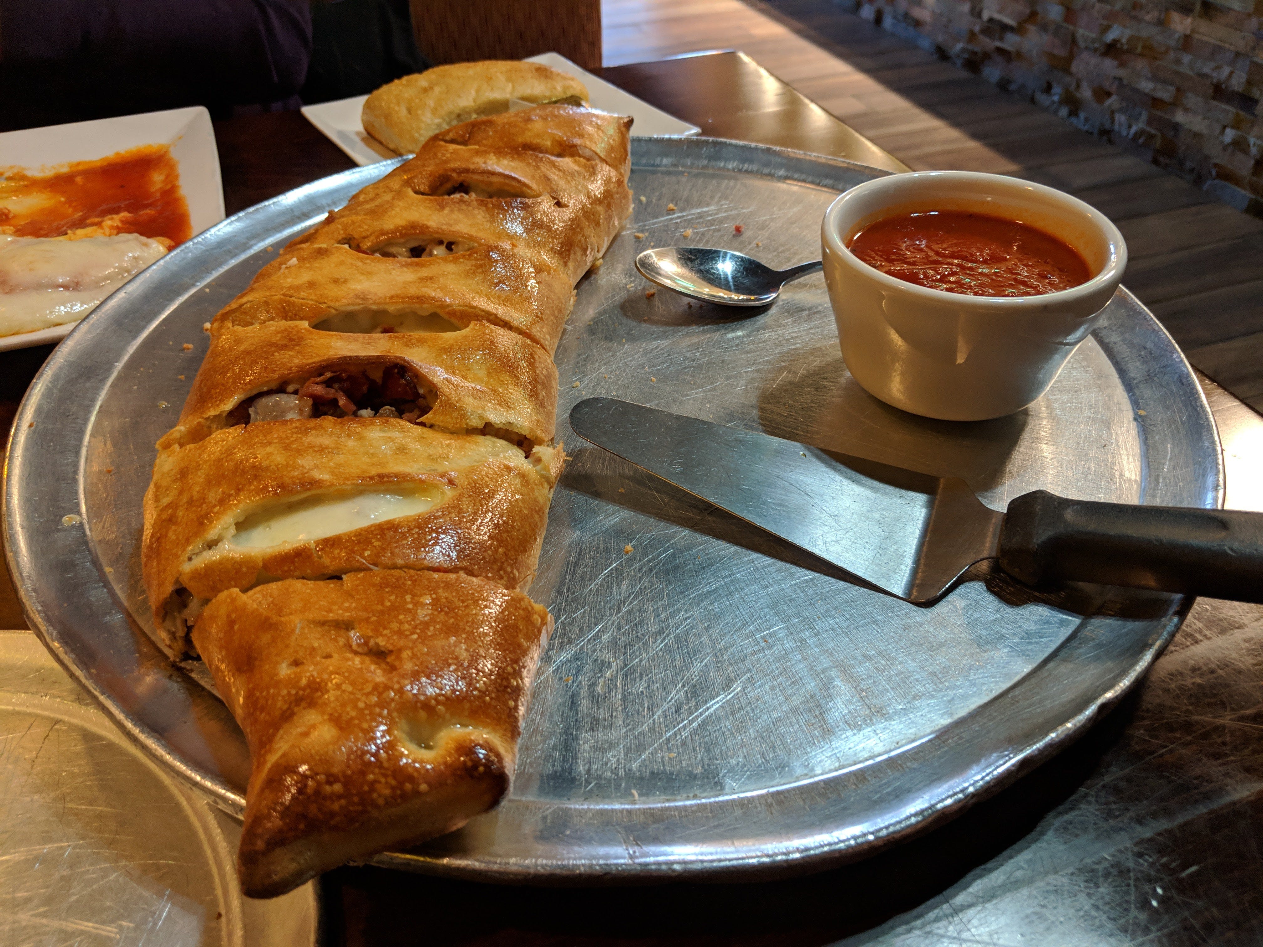 Order Meat Lover's Stromboli - Small food online from Zio's Pizza store, Allentown on bringmethat.com