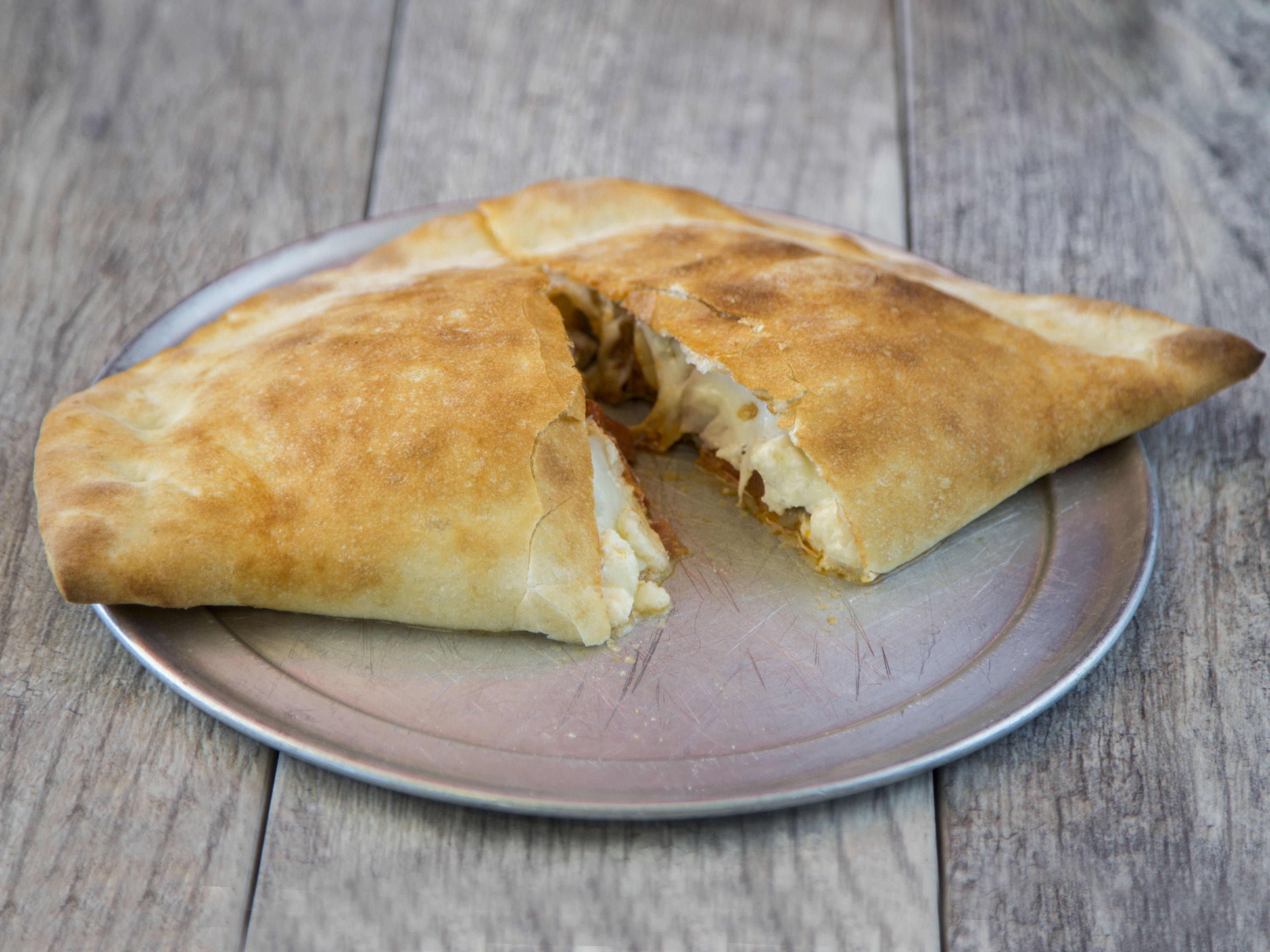 Order Calzone Special food online from Famous Ray's Pizza store, Glendale on bringmethat.com