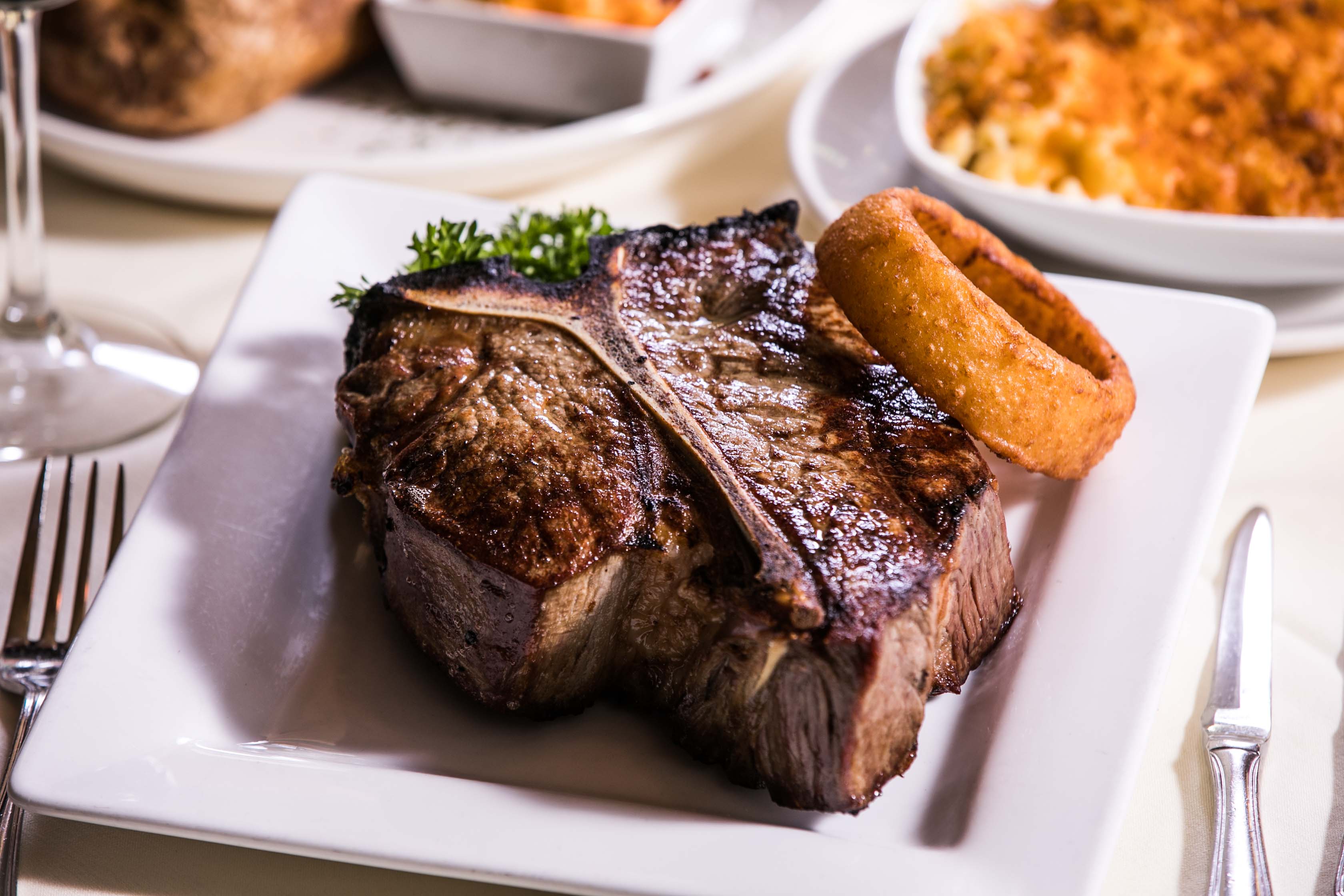 Order Wet-Aged Porterhouse food online from Safehouse Chicago store, Chicago on bringmethat.com