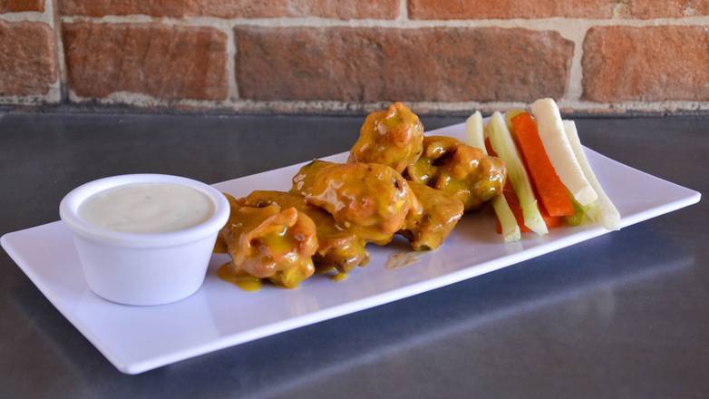 Order The Mango Habanero Wings food online from The Burger Co store, Detroit on bringmethat.com