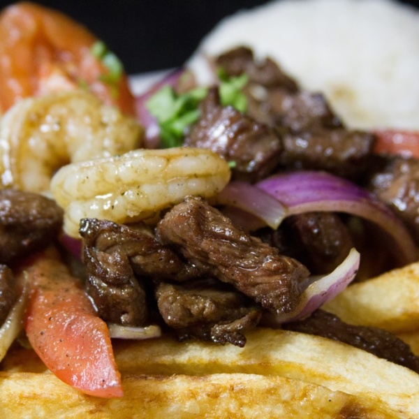 Order Mar y Tierra food online from Chios Peruvian Grill store, Los Angeles on bringmethat.com