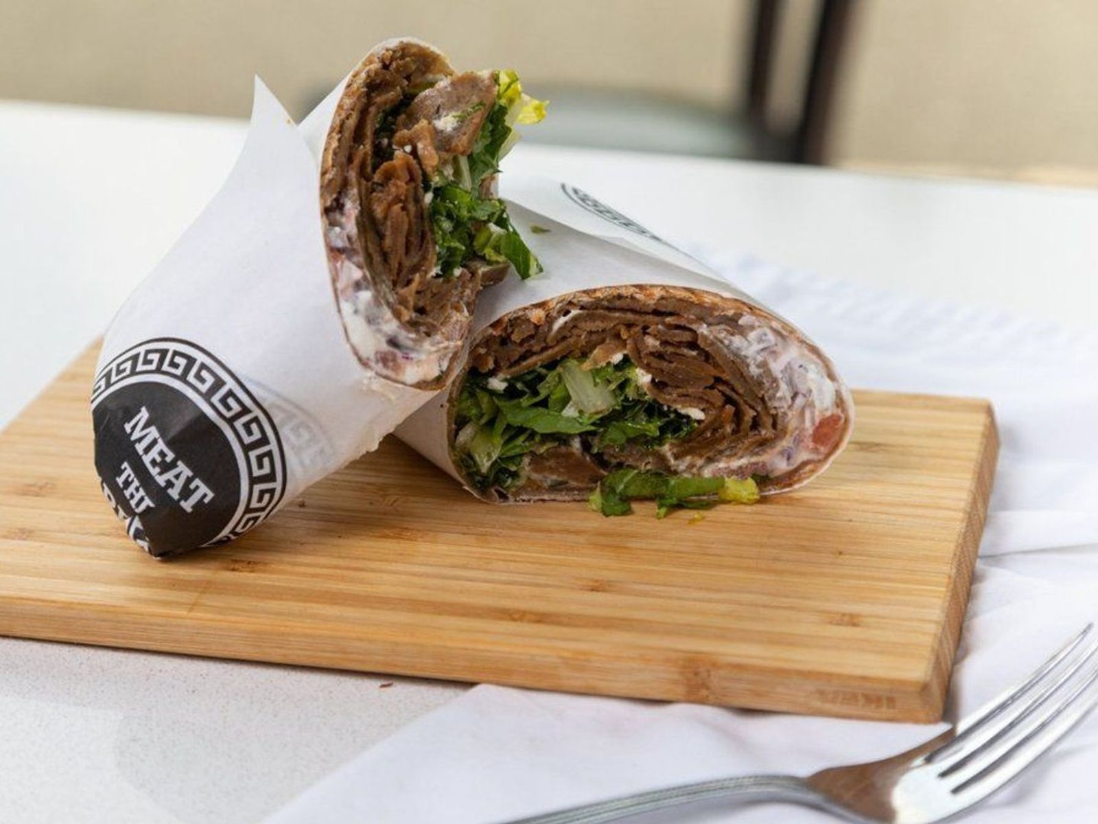 Order Lamb/ Beef  Toasted Wrap  food online from Meat The Greek store, Eastchester on bringmethat.com