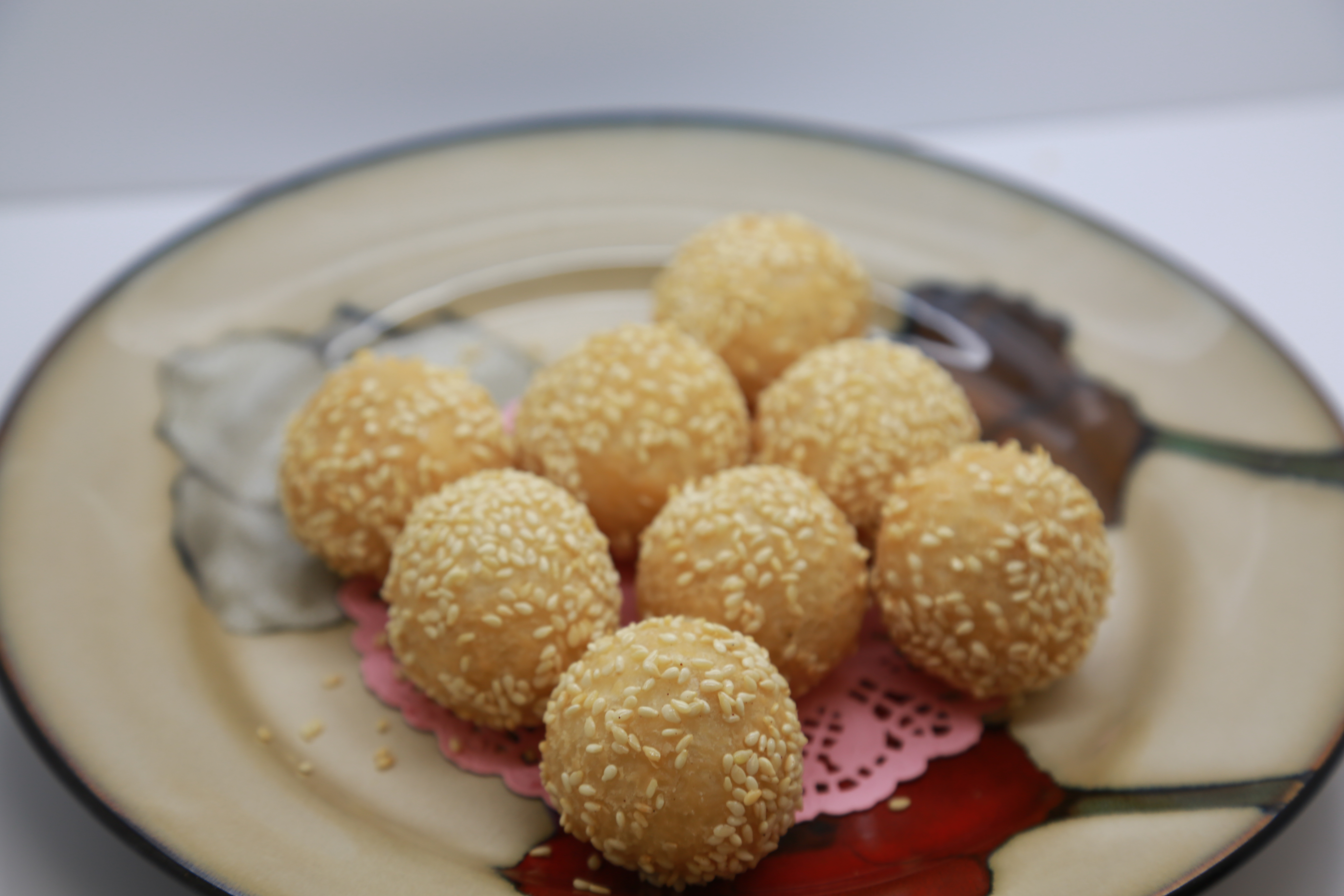 Order SN06. Fried Sesame Balls (8) 炸芝麻球 food online from Uncle Chen Primetime store, State College on bringmethat.com