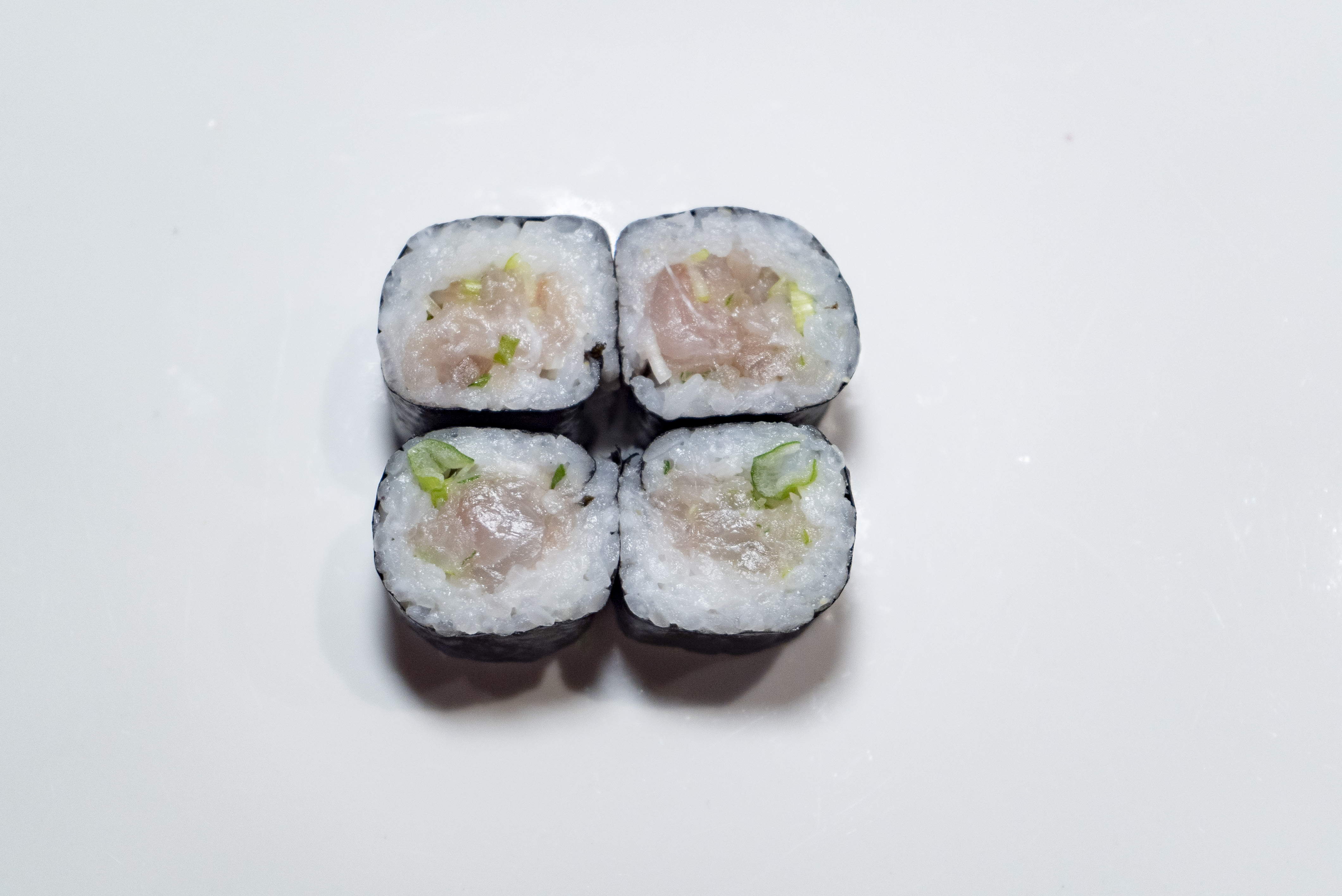 Order Yellowtail Scallion Roll food online from Zutto Japanese American Pub store, New York on bringmethat.com
