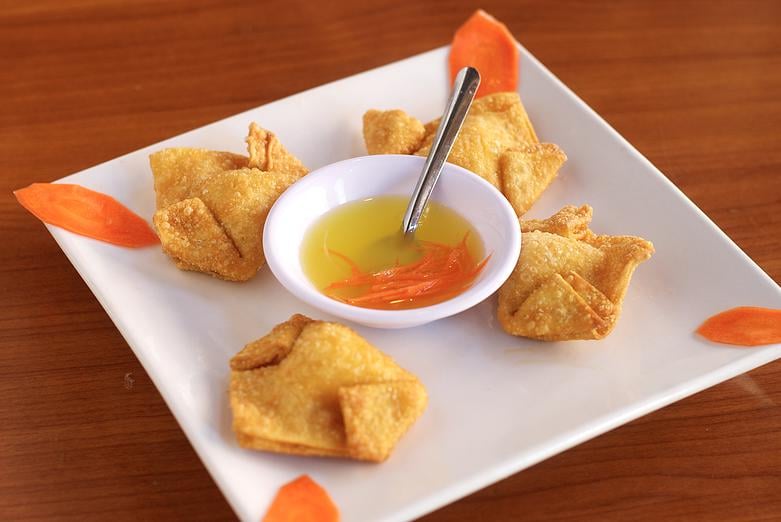 Order 8. Crab Rangoon food online from Miss Saigon store, San Francisco on bringmethat.com