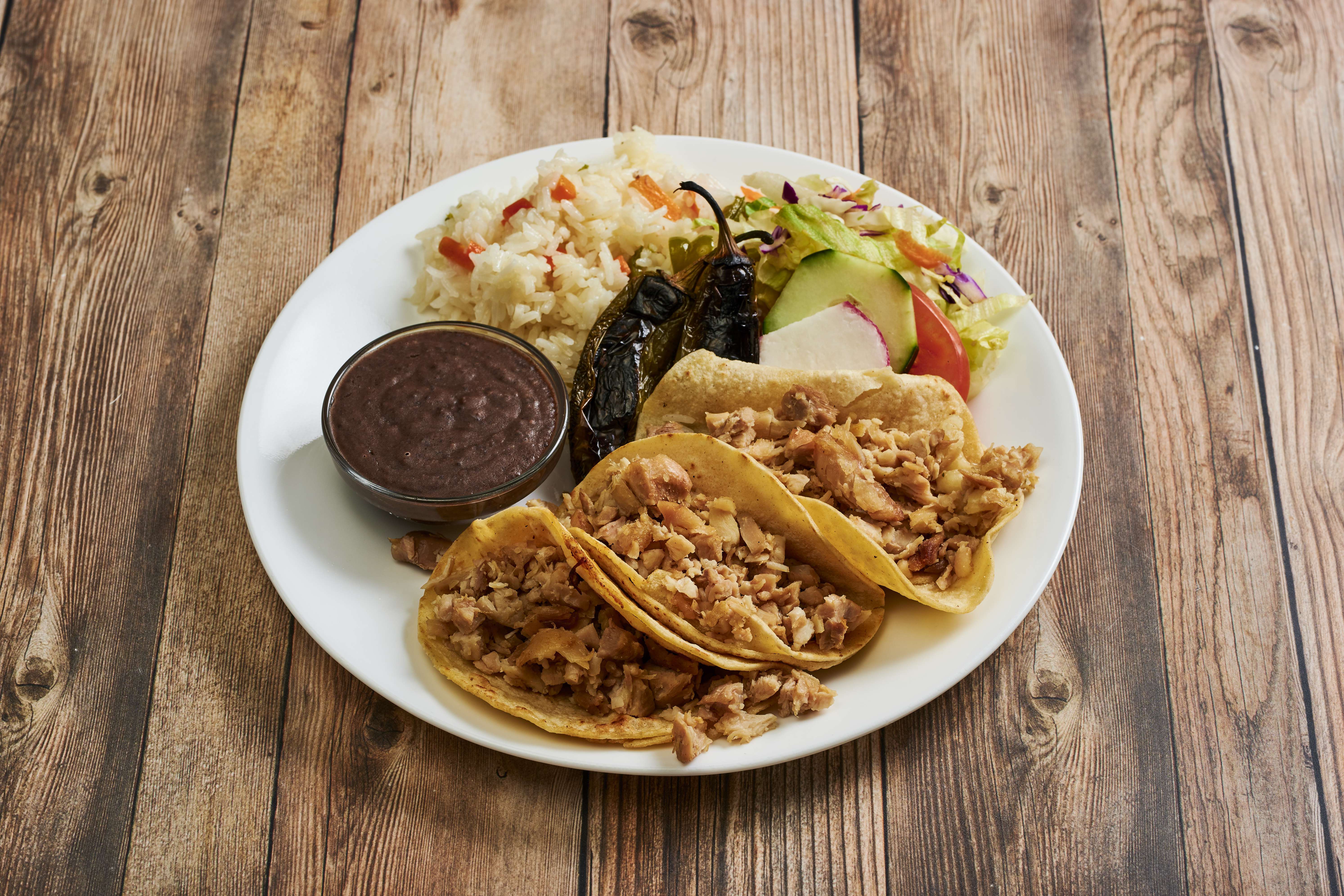Order 7. Tacos food online from California Grill Restaurant store, Los Angeles on bringmethat.com