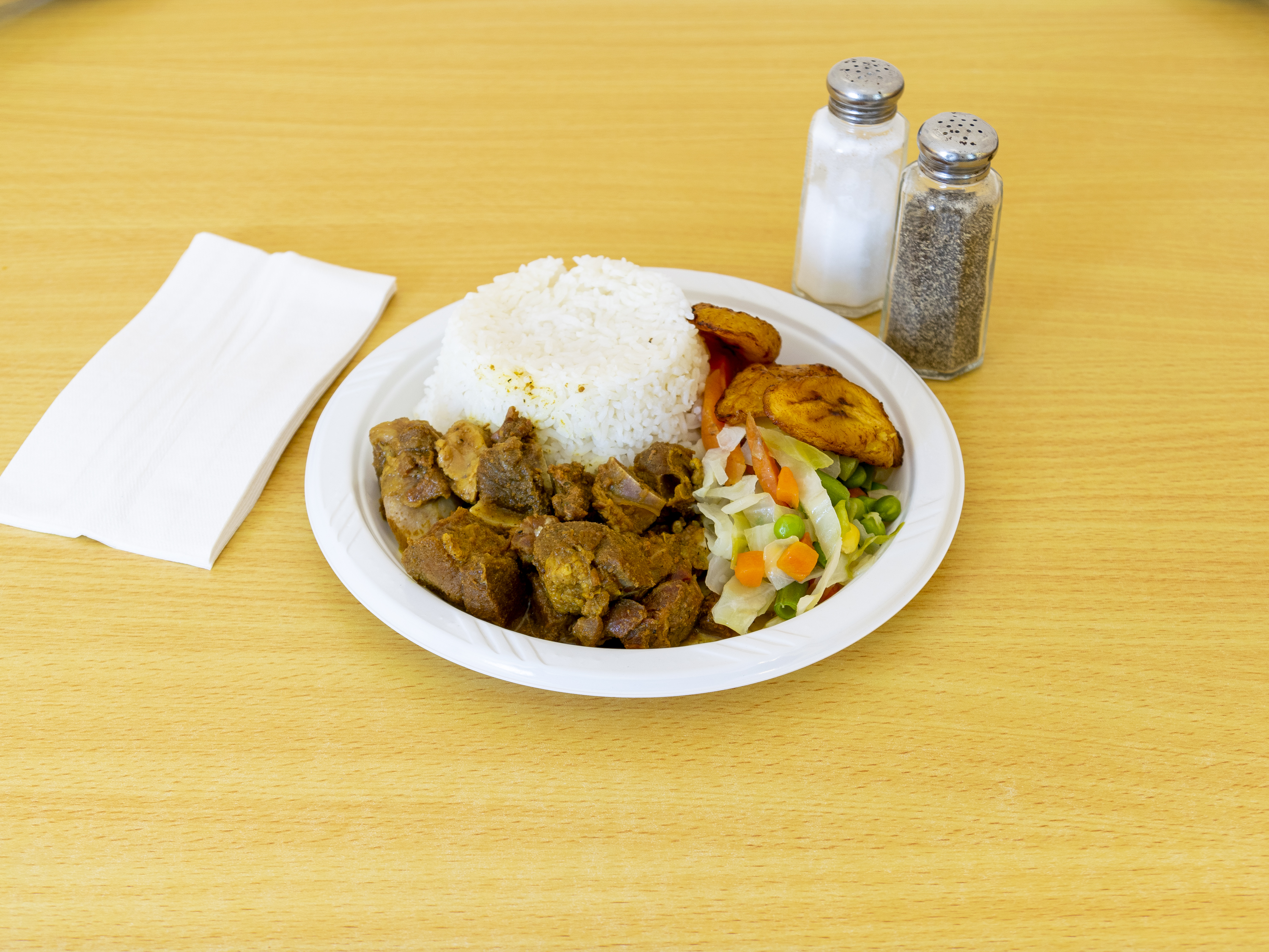 Order Curry Goat food online from Island Spice Restaurant, LLC store, Spring Valley on bringmethat.com