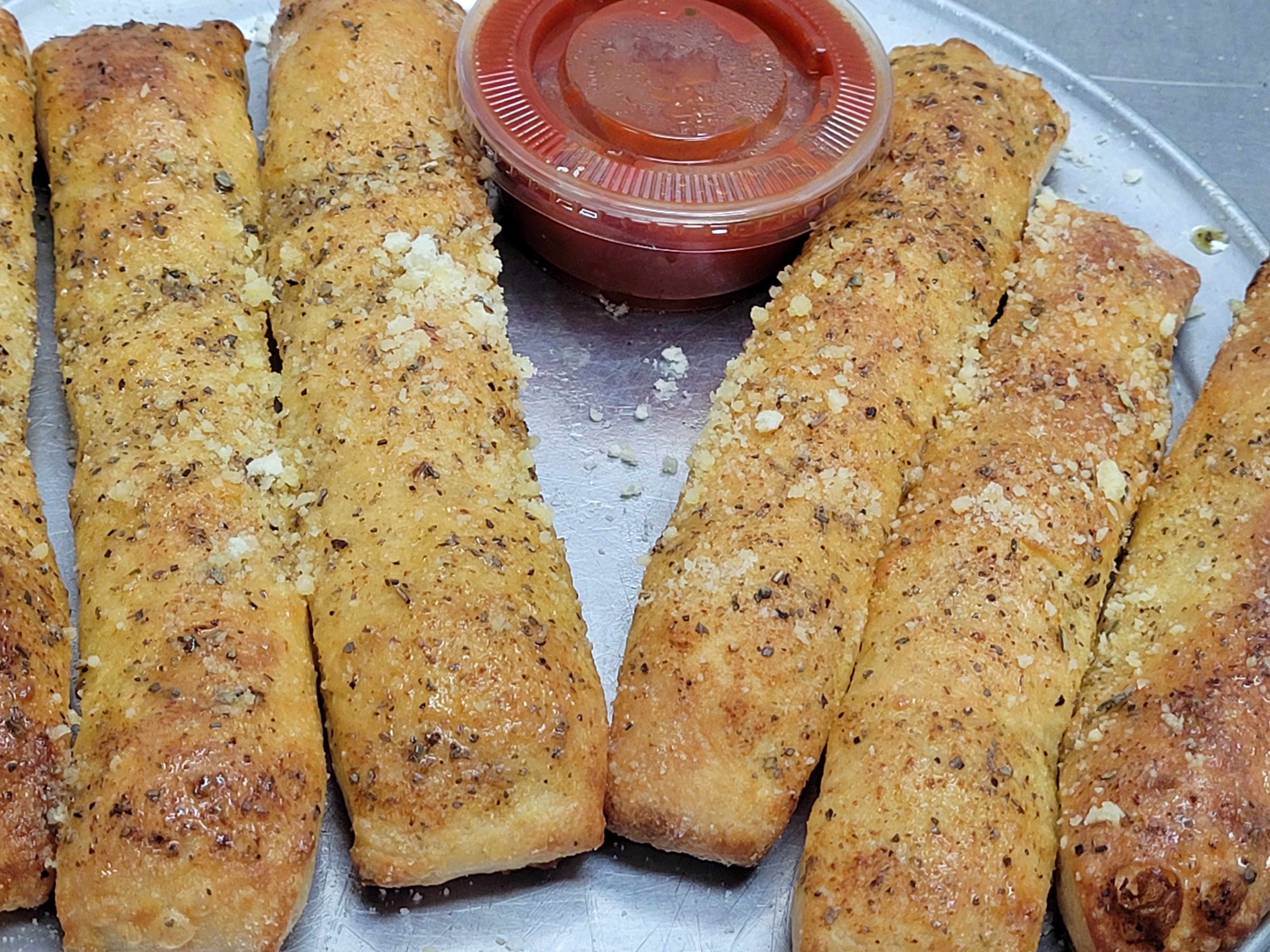 Order Bread Sticks Without Cheese food online from Illianos Pizza store, Clemmons on bringmethat.com