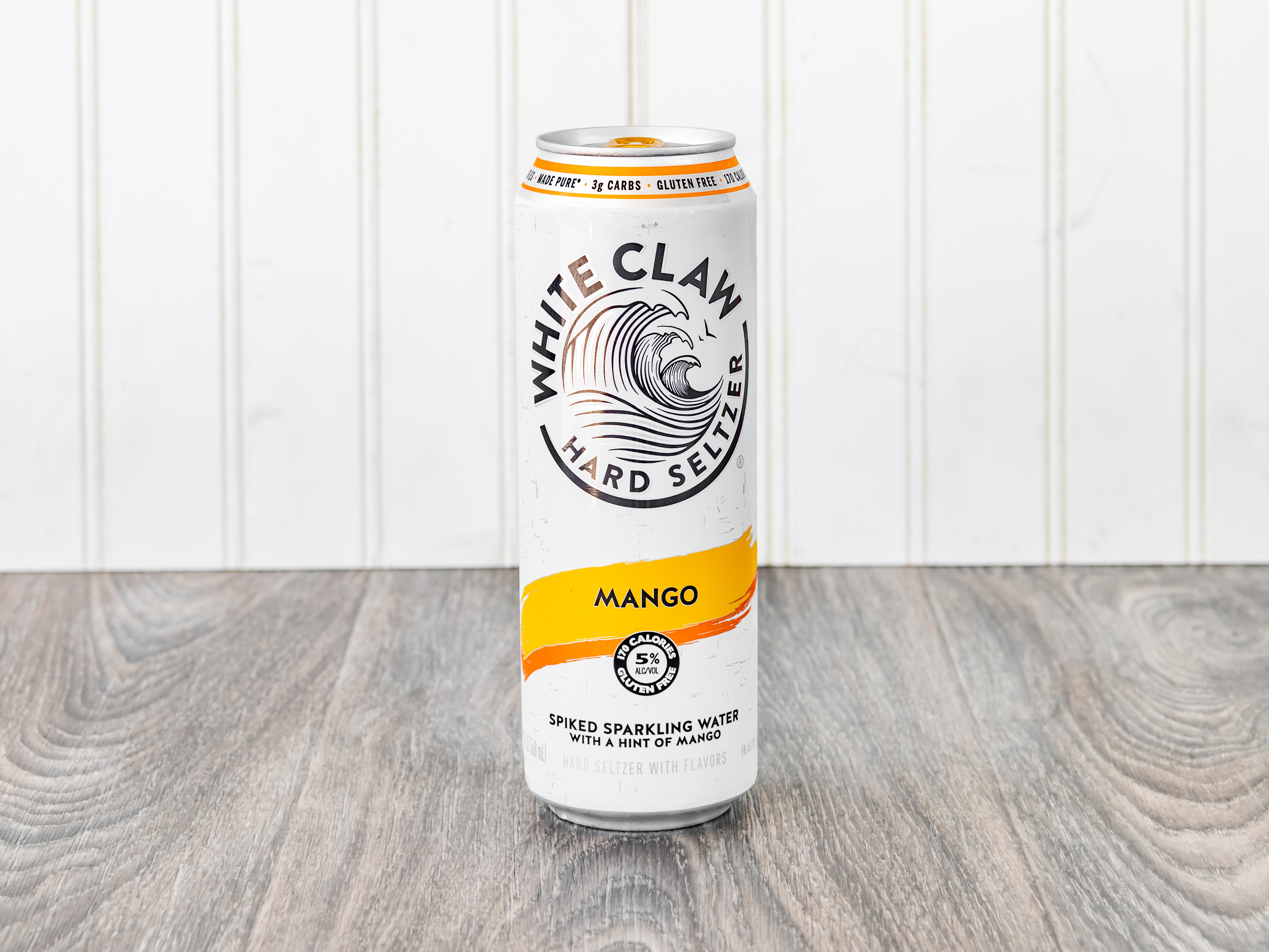 Order White Claw Mango 24 oz Can food online from Chevron Extramile store, Castro Valley on bringmethat.com
