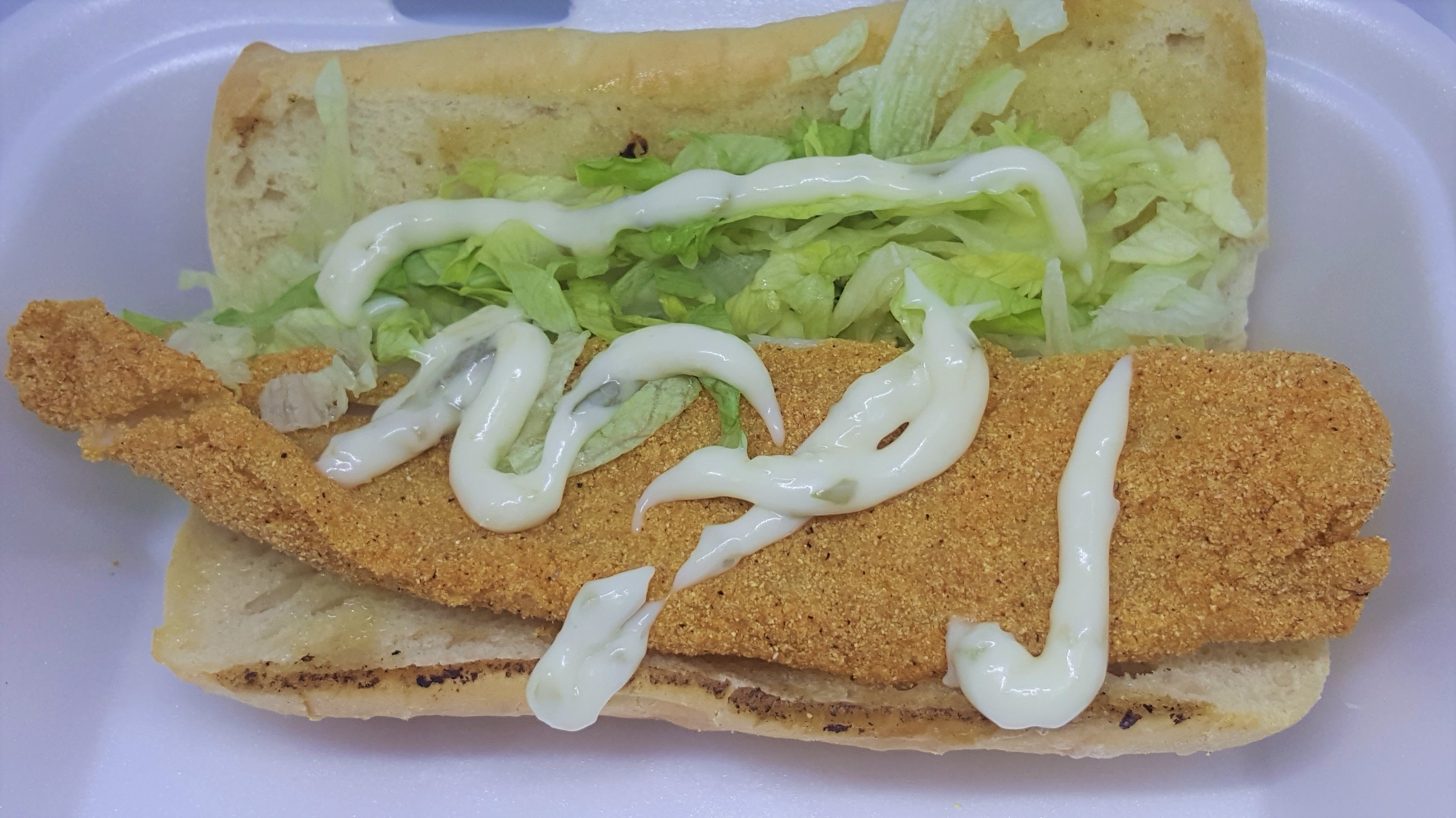 Order FISH SANDWICH food online from Carnival Cafe store, Owensboro on bringmethat.com