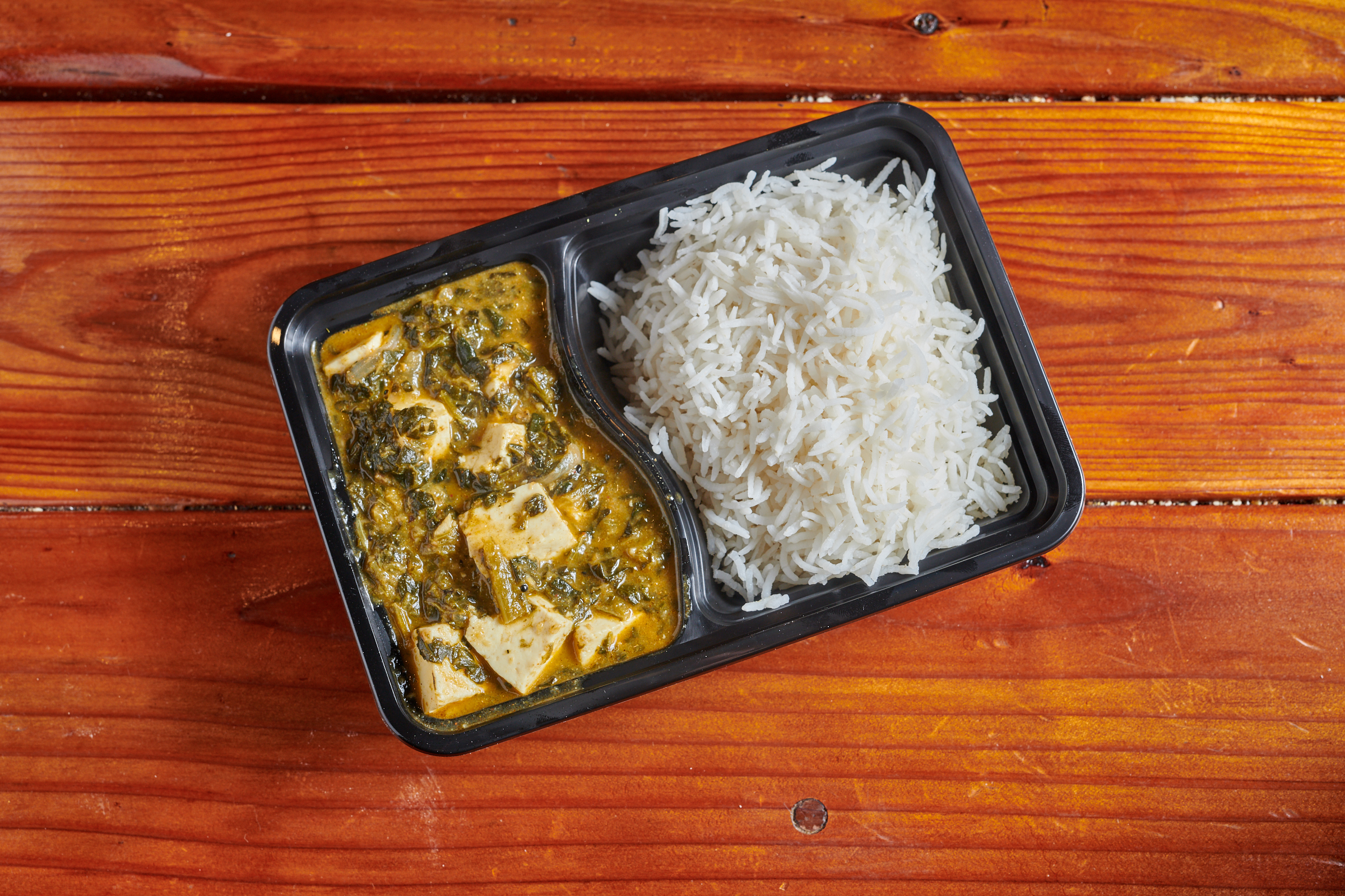 Order Saag  Curry food online from Barbarian Pizza store, Berkeley on bringmethat.com
