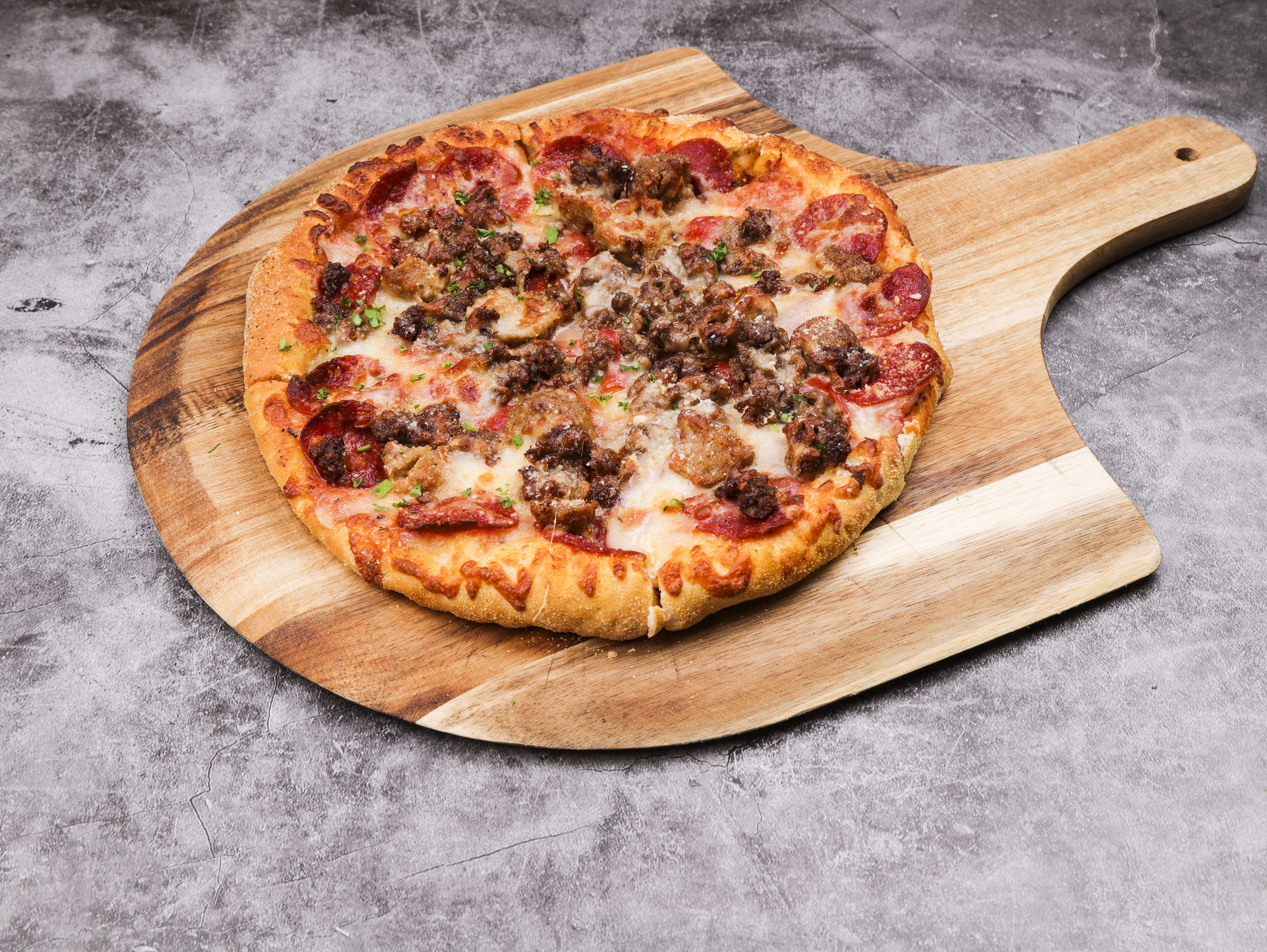 Order Meat Lover Pizza food online from Adam Pizza & Wings store, Toledo on bringmethat.com