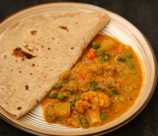 Order Chapathi Kurma (2 Pcs) food online from Malgudi Veg store, Ashburn on bringmethat.com