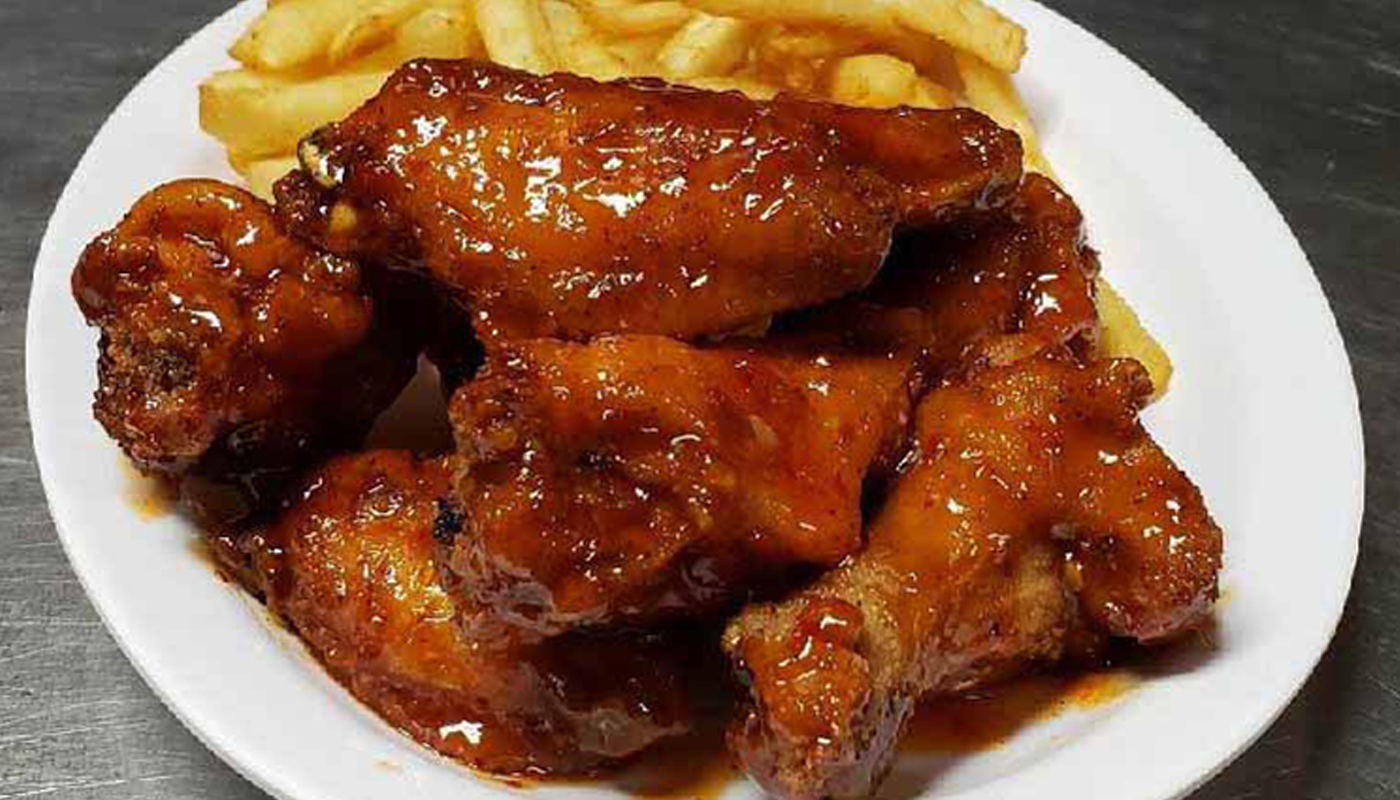 Order Pixie Wings  (Drenched in Spicy Sweet Chili Sauce) food online from Lavender Blue Restaurant Lounge store, Inglewood on bringmethat.com