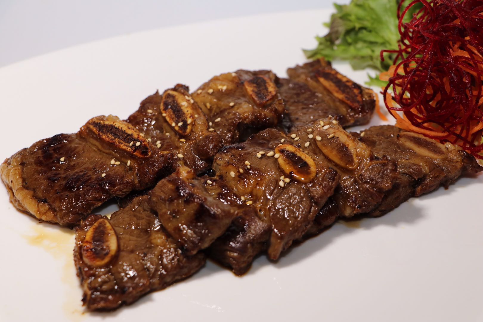 Order Beef Short Ribs food online from Naked Fish Japanese Restaurant store, Chino Hills on bringmethat.com