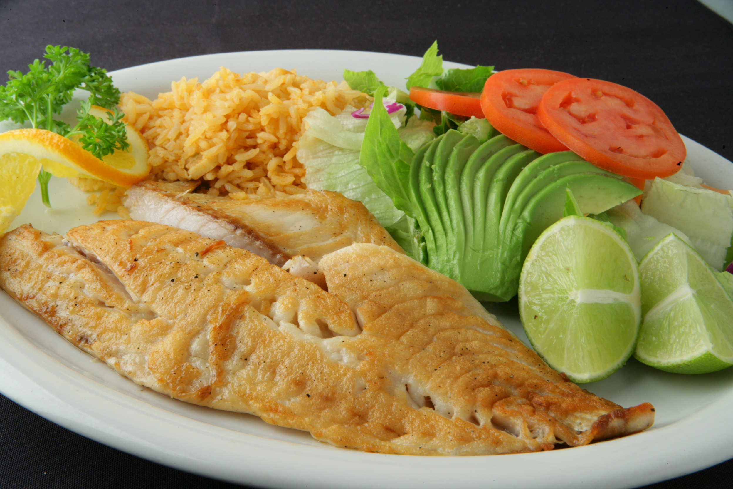 Order #107. Fillet Fish Garlic Style Combo food online from Chapala Mexican Restaurant store, Brentwood on bringmethat.com