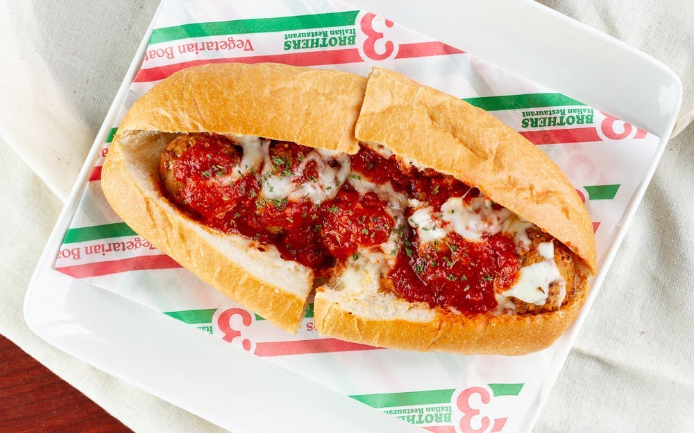 Order Meatball Parmesan Sub - 8" food online from Three Brothers Italian Restaurant store, Bowie on bringmethat.com