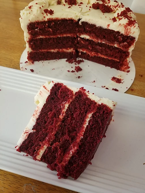 Order Slice of Red Velvet Cake food online from Who Doesnt Like Cake? store, Birmingham on bringmethat.com