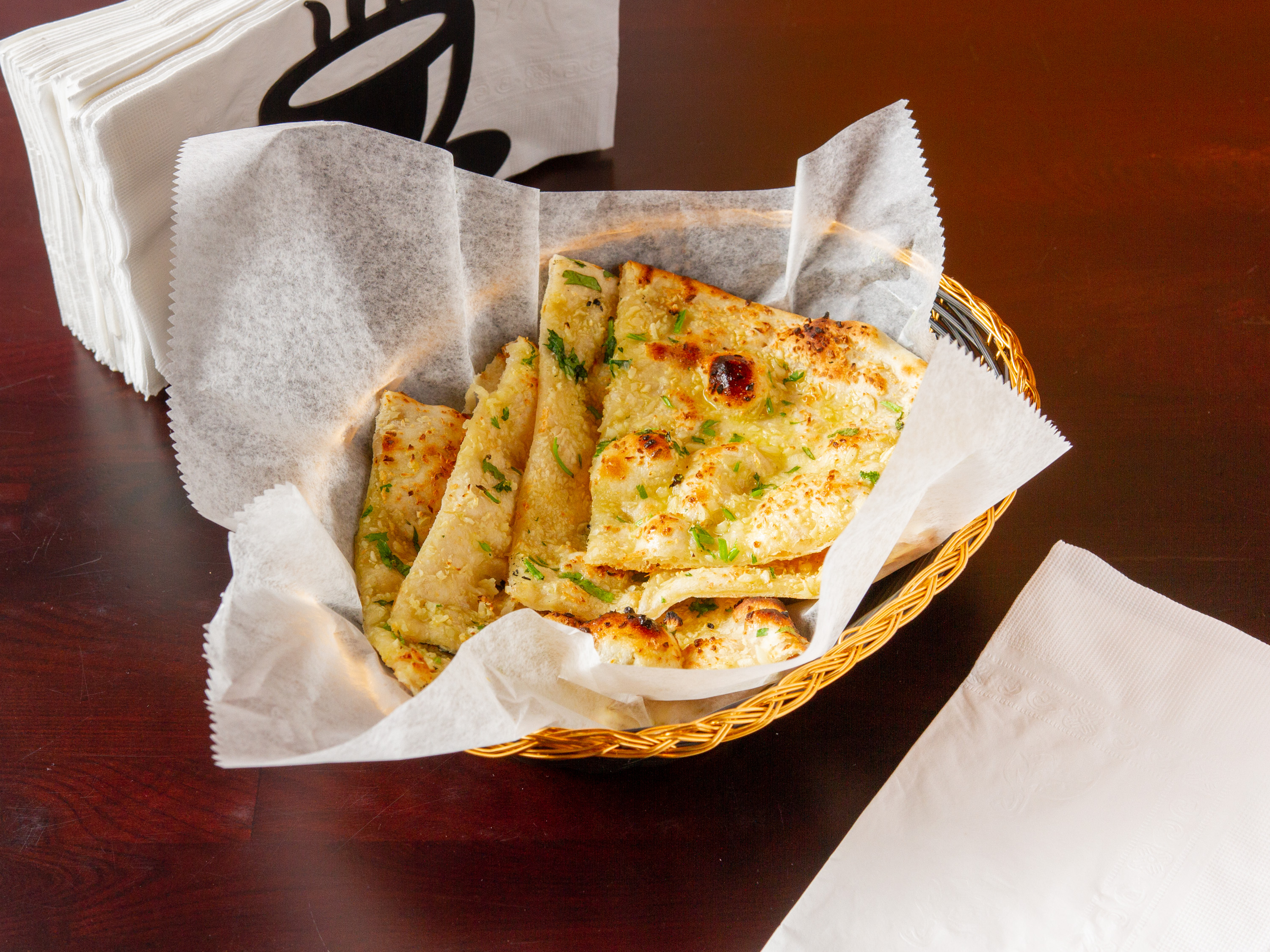 Order Garlic Naan food online from Persis Biryani Indian Grill store, Catonsville on bringmethat.com