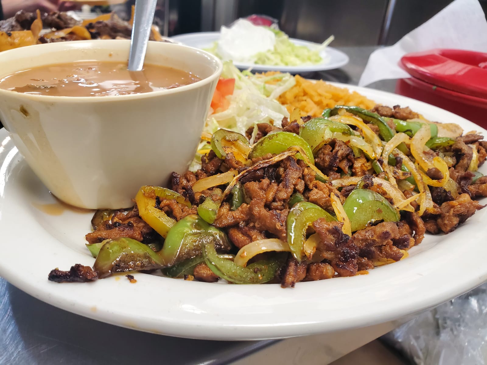 Order Pastor Plate food online from Los Arcos Mexican Grill store, San Antonio on bringmethat.com