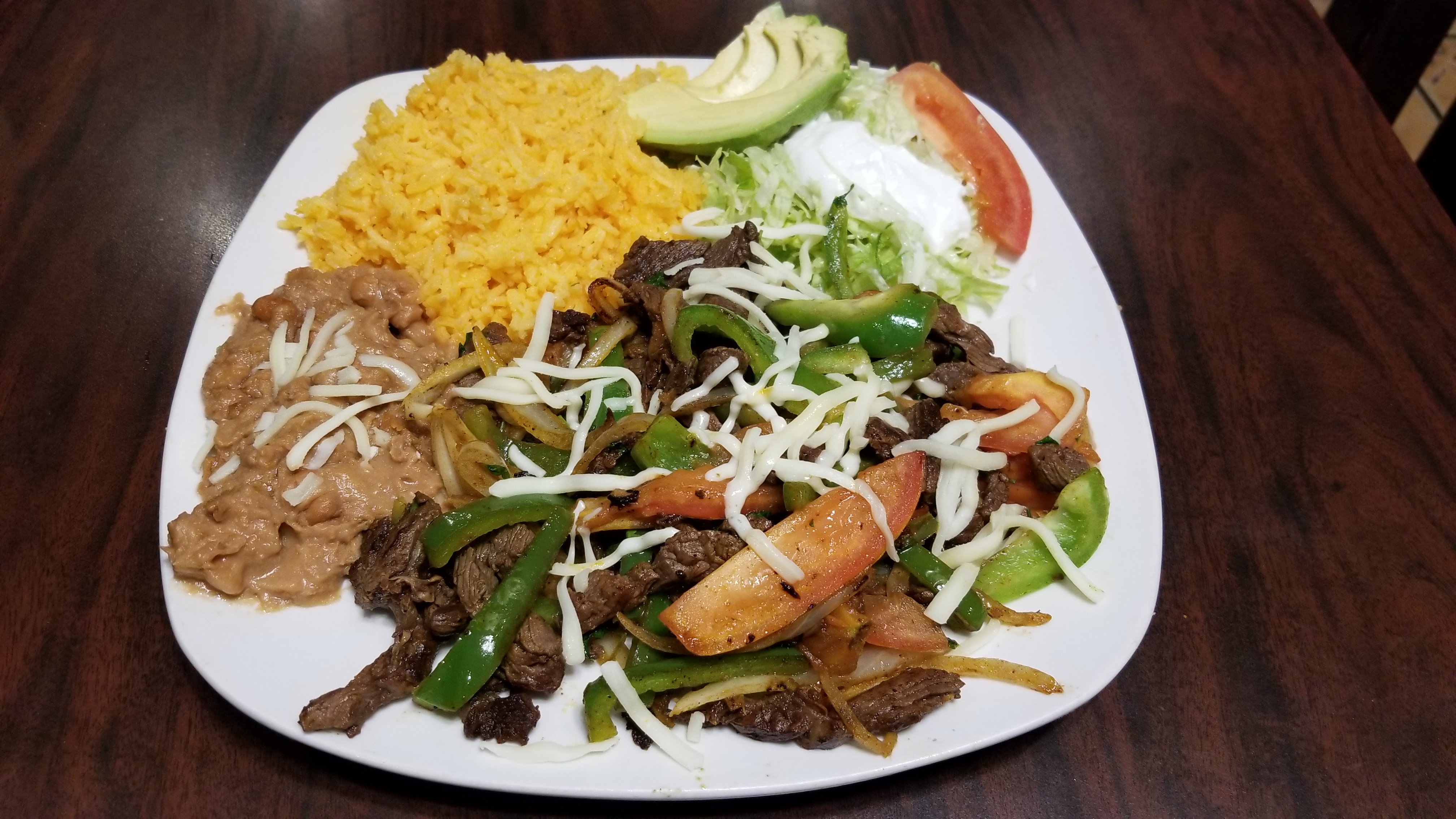Order Fajitas food online from Martinez Tacos Restaurant store, Kankakee on bringmethat.com