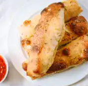 Order Garlic Bread Sticks food online from Fuzzy's Pizza & Italian Cafe store, Houston on bringmethat.com