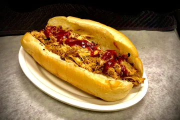 Order Pulled Pork Sandwich food online from Lucky Chicago Style Grill store, Round Rock on bringmethat.com